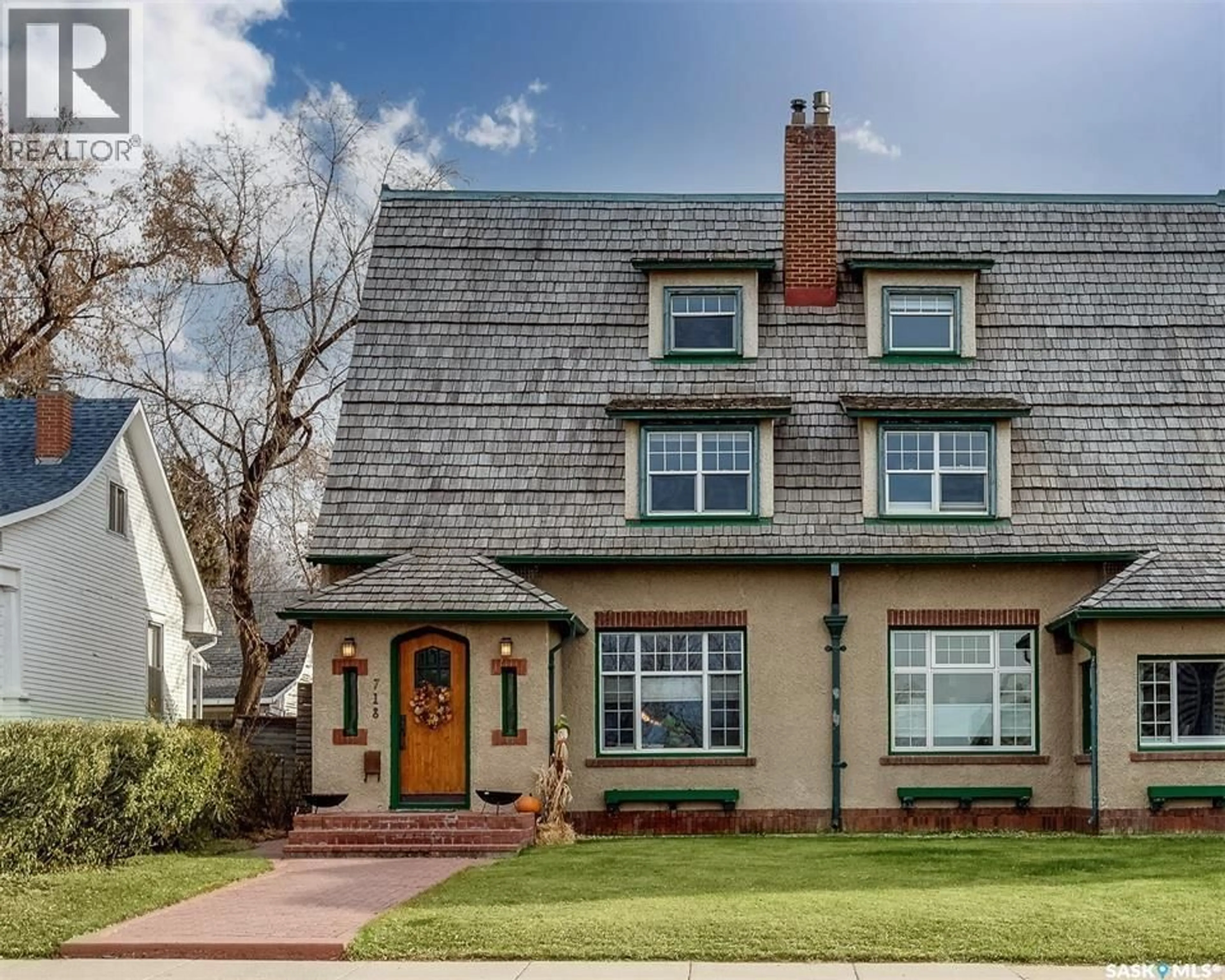 Home with brick exterior material, street for 718 SASKATCHEWAN CRESCENT, Saskatoon Saskatchewan S7N0L2