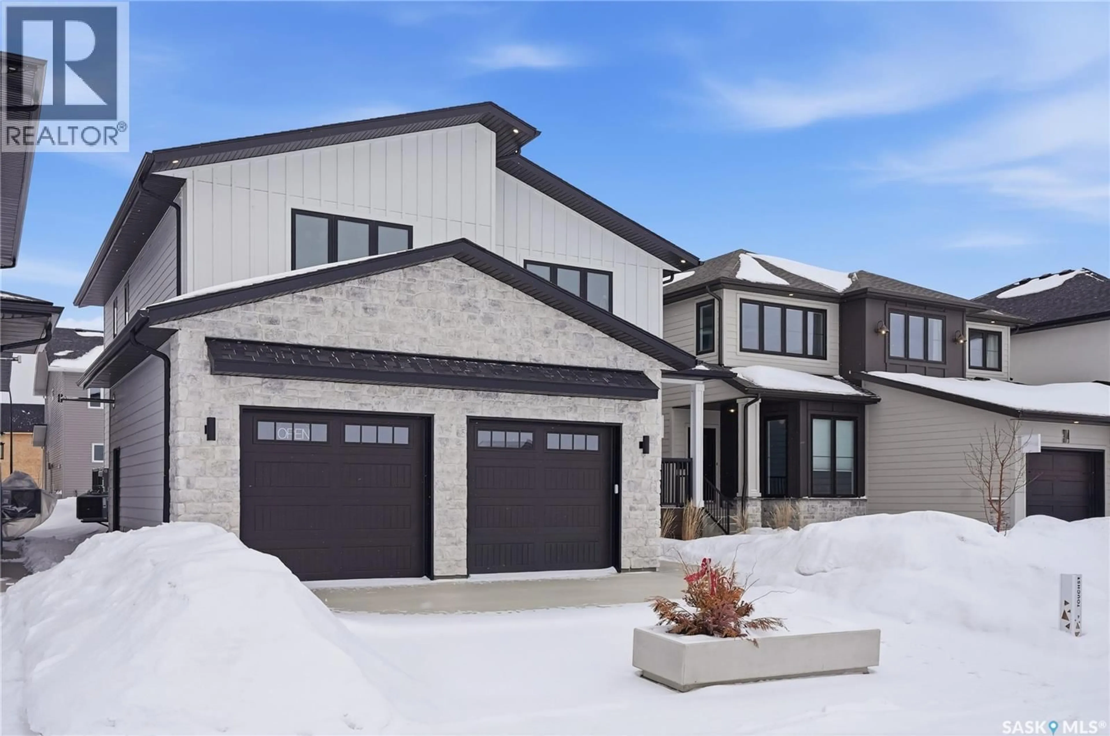 Home with brick exterior material, street for 318 TAUBE GREEN, Saskatoon Saskatchewan S7V1M4