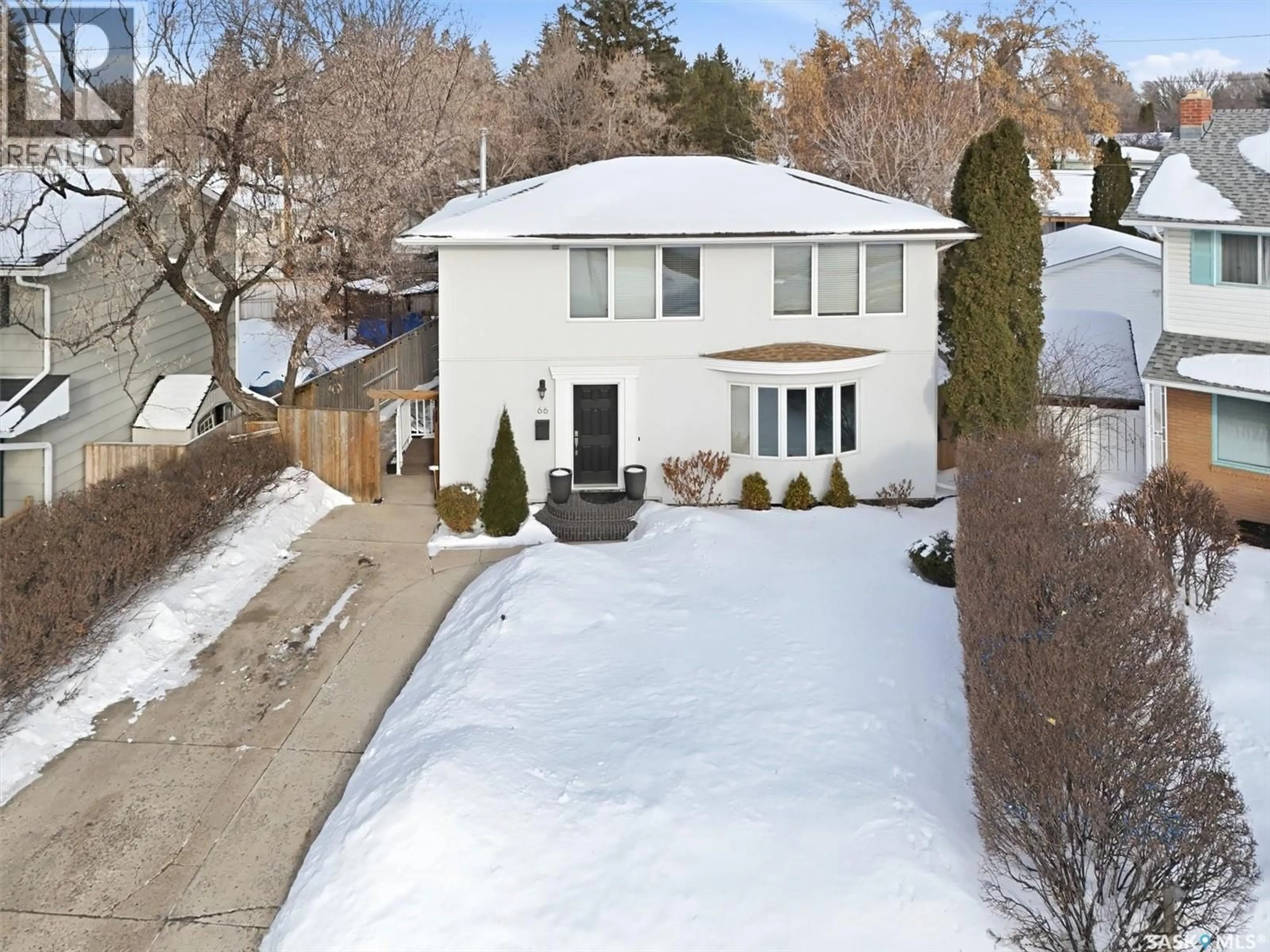 A pic from outside/outdoor area/front of a property/back of a property/a pic from drone, street for 66 MURPHY CRESCENT, Saskatoon Saskatchewan S7J2T4