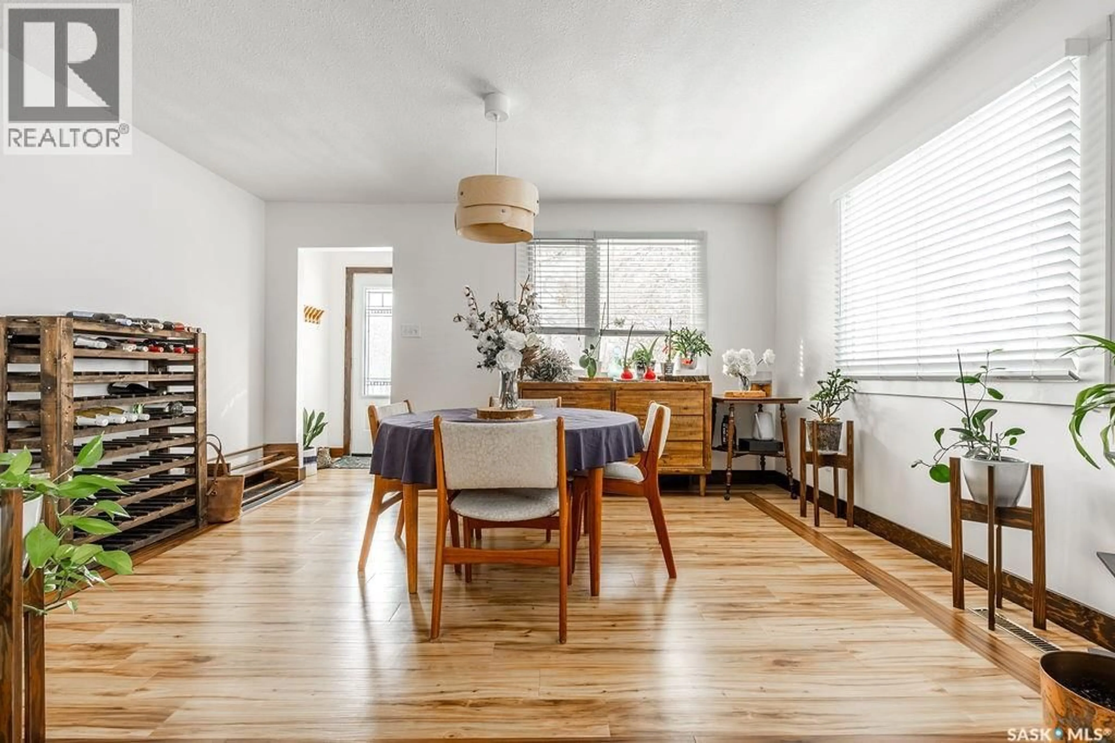 Dining room, wood/laminate floor for 612 M AVENUE, Saskatoon Saskatchewan S7M2L2