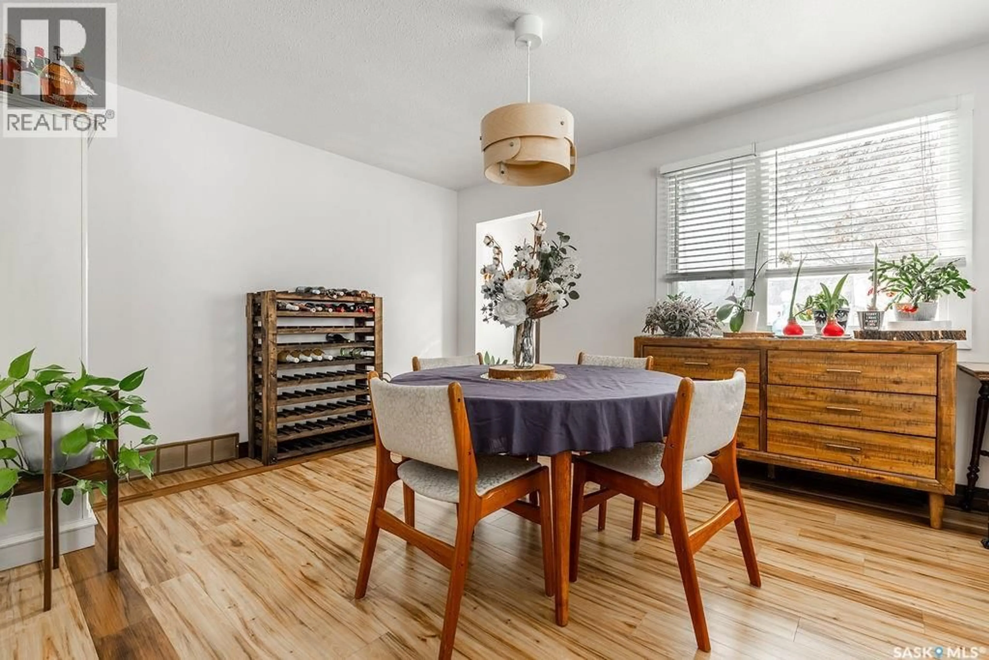 Dining room, wood/laminate floor for 612 M AVENUE, Saskatoon Saskatchewan S7M2L2