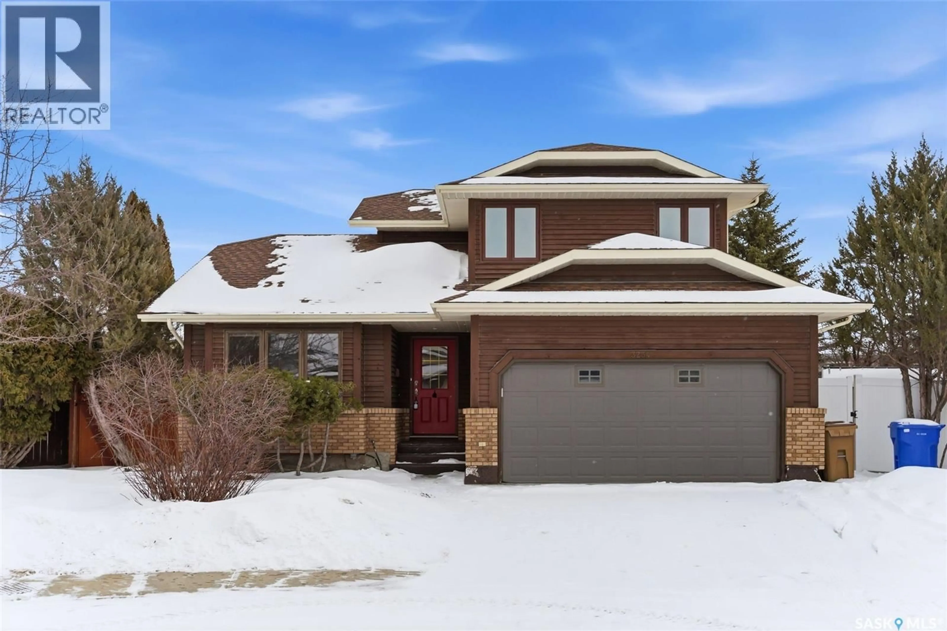Home with brick exterior material, street for 3234 WASCANA GLEN, Regina Saskatchewan S4V2L6