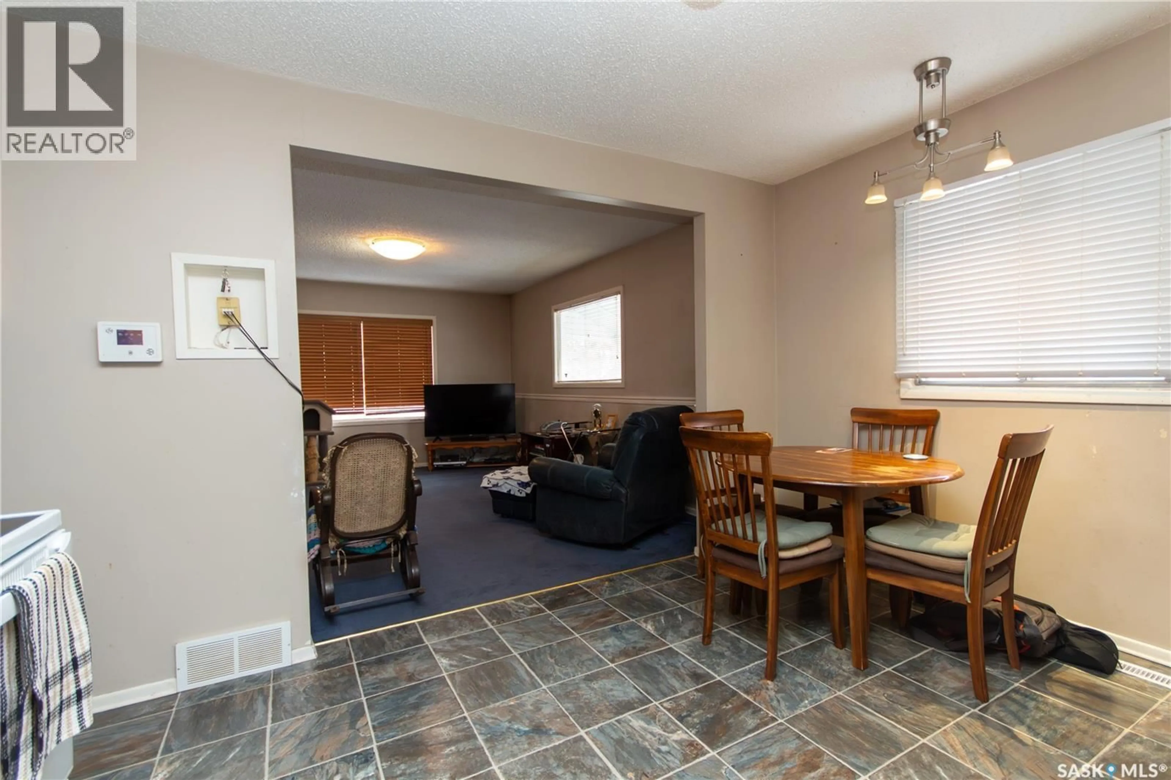 Living room with furniture, unknown for 1701 102ND STREET, North Battleford Saskatchewan S9A1H2