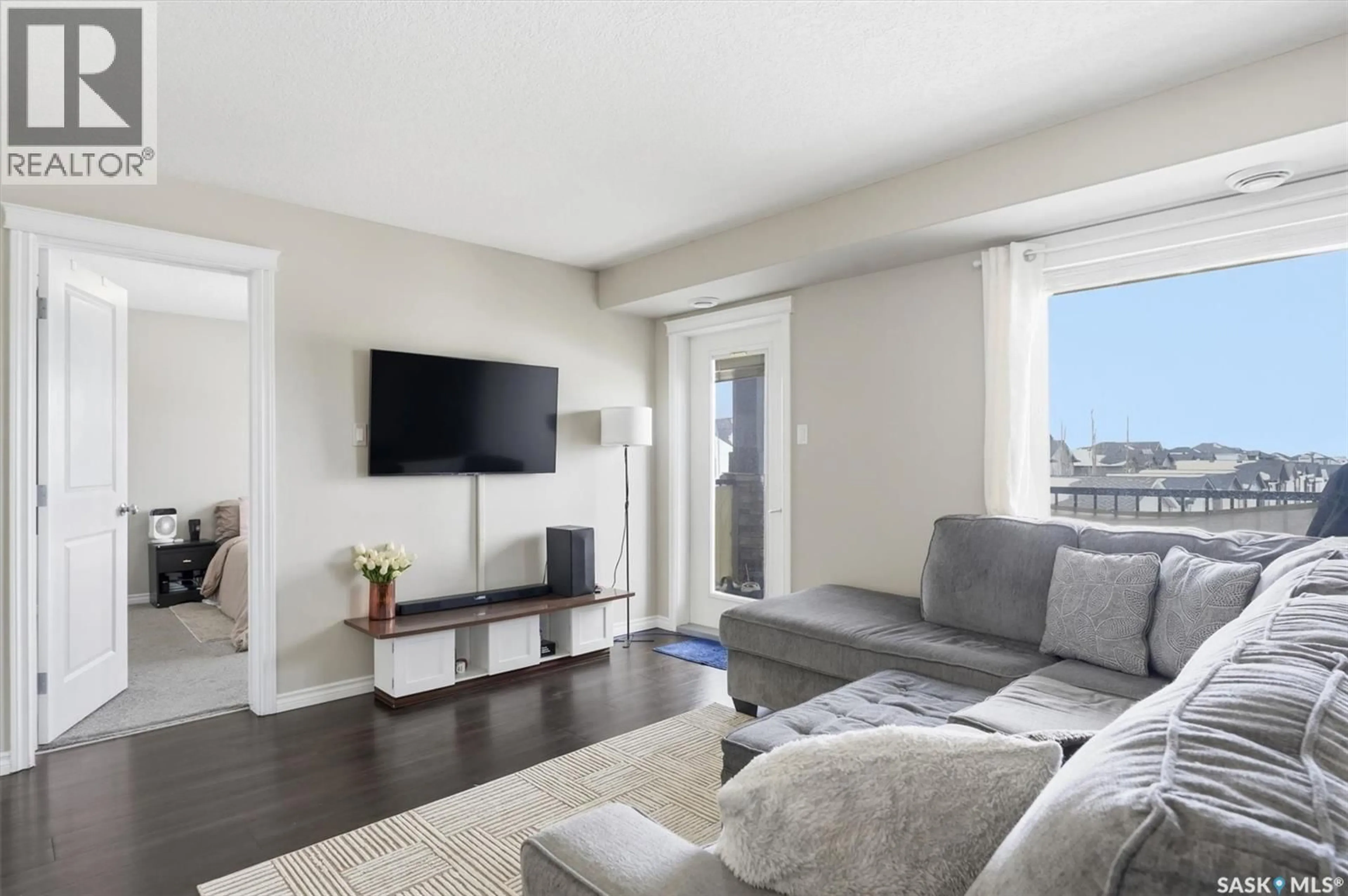 Living room with furniture, unknown for 210 - 213 RAJPUT WAY, Saskatoon Saskatchewan S7W0V7