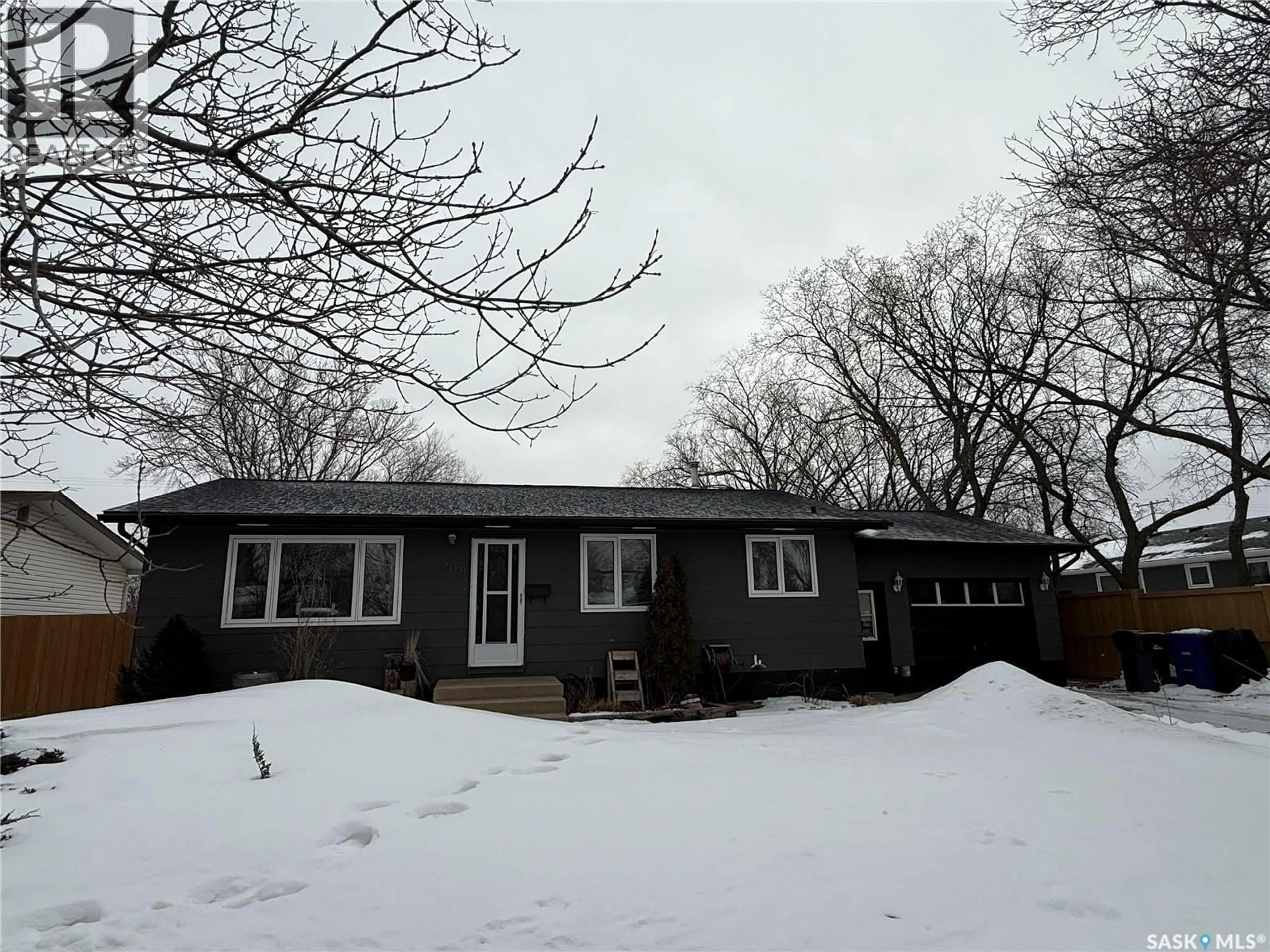 A pic from outside/outdoor area/front of a property/back of a property/a pic from drone, street for 708 BRIMACOMBE DRIVE, Weyburn Saskatchewan S4H2P8