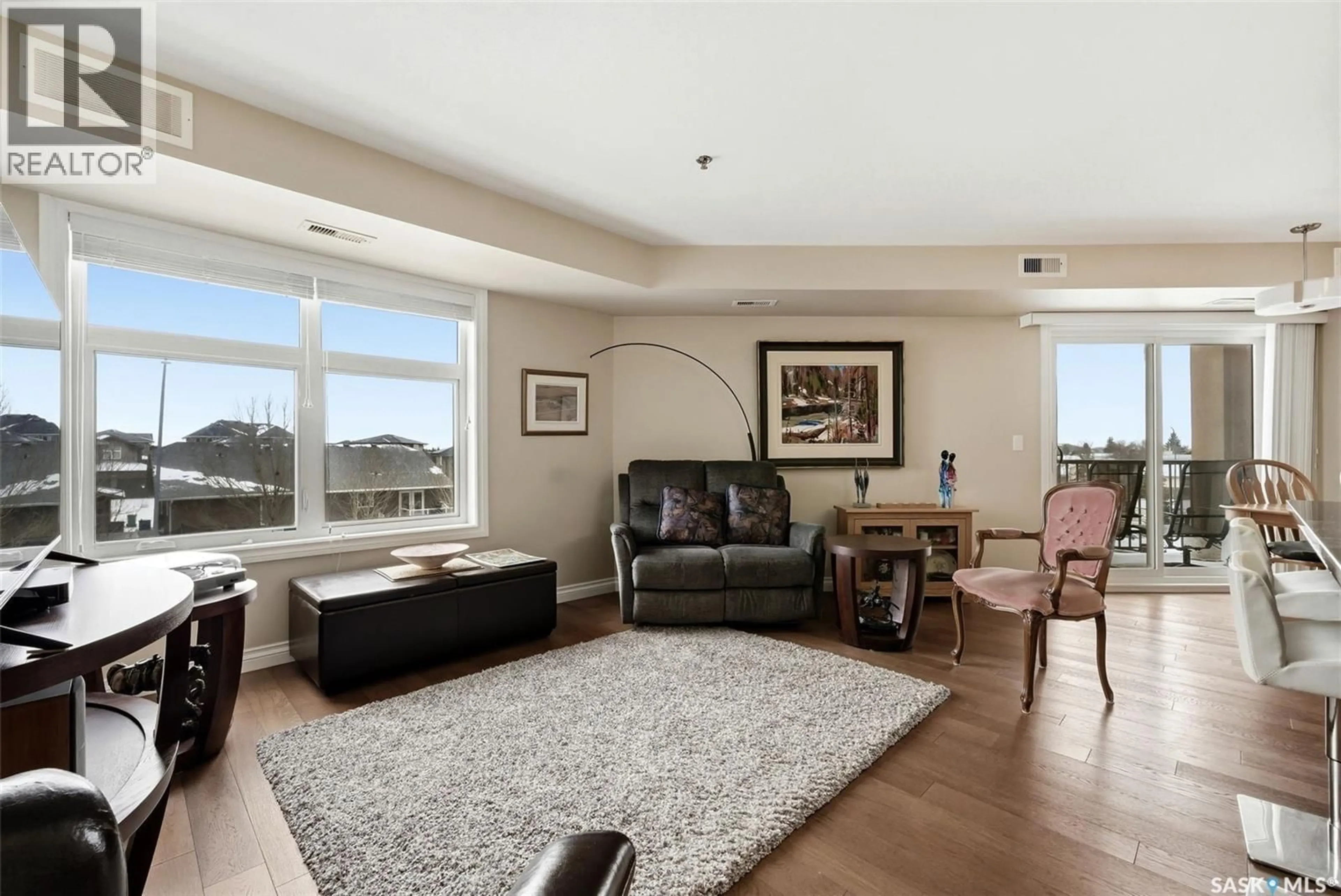 Living room with furniture, unknown for E - 214 3630 HAUGHTON ROAD, Regina Saskatchewan S4V1P1