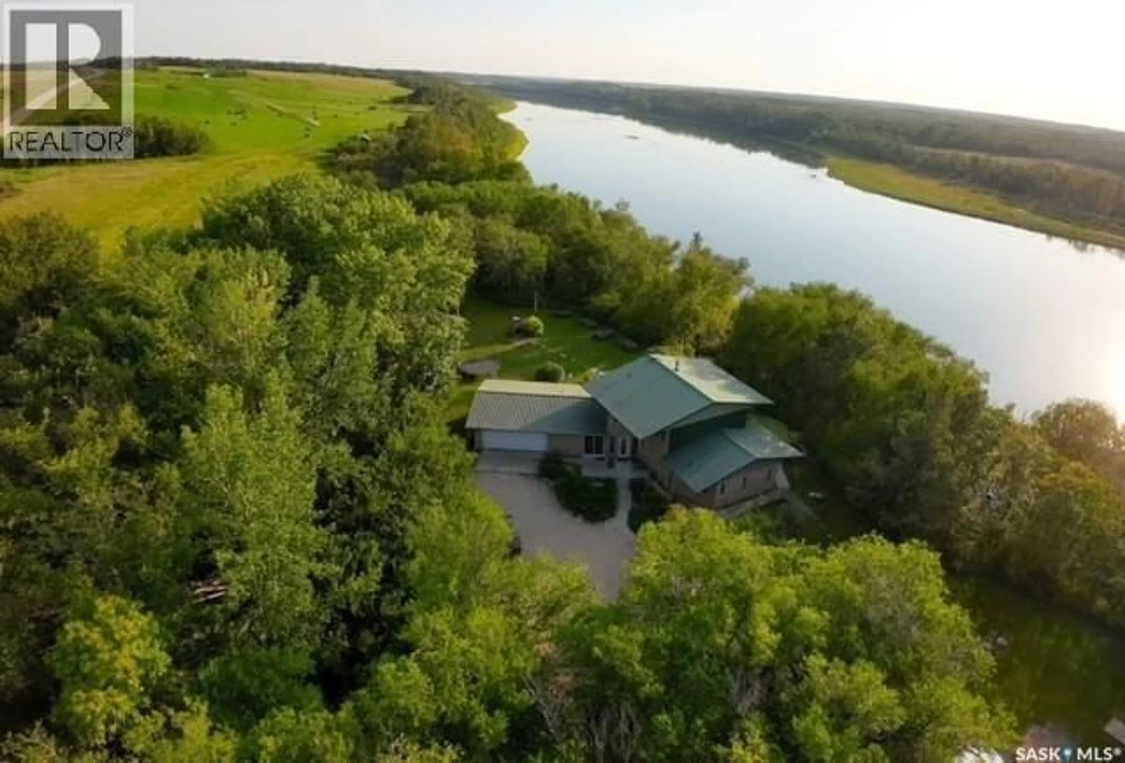 A pic from outside/outdoor area/front of a property/back of a property/a pic from drone, water/lake/river/ocean view for DERKSEN RIVERFRONT, St. Louis RM No. 431 Saskatchewan S0K4P0
