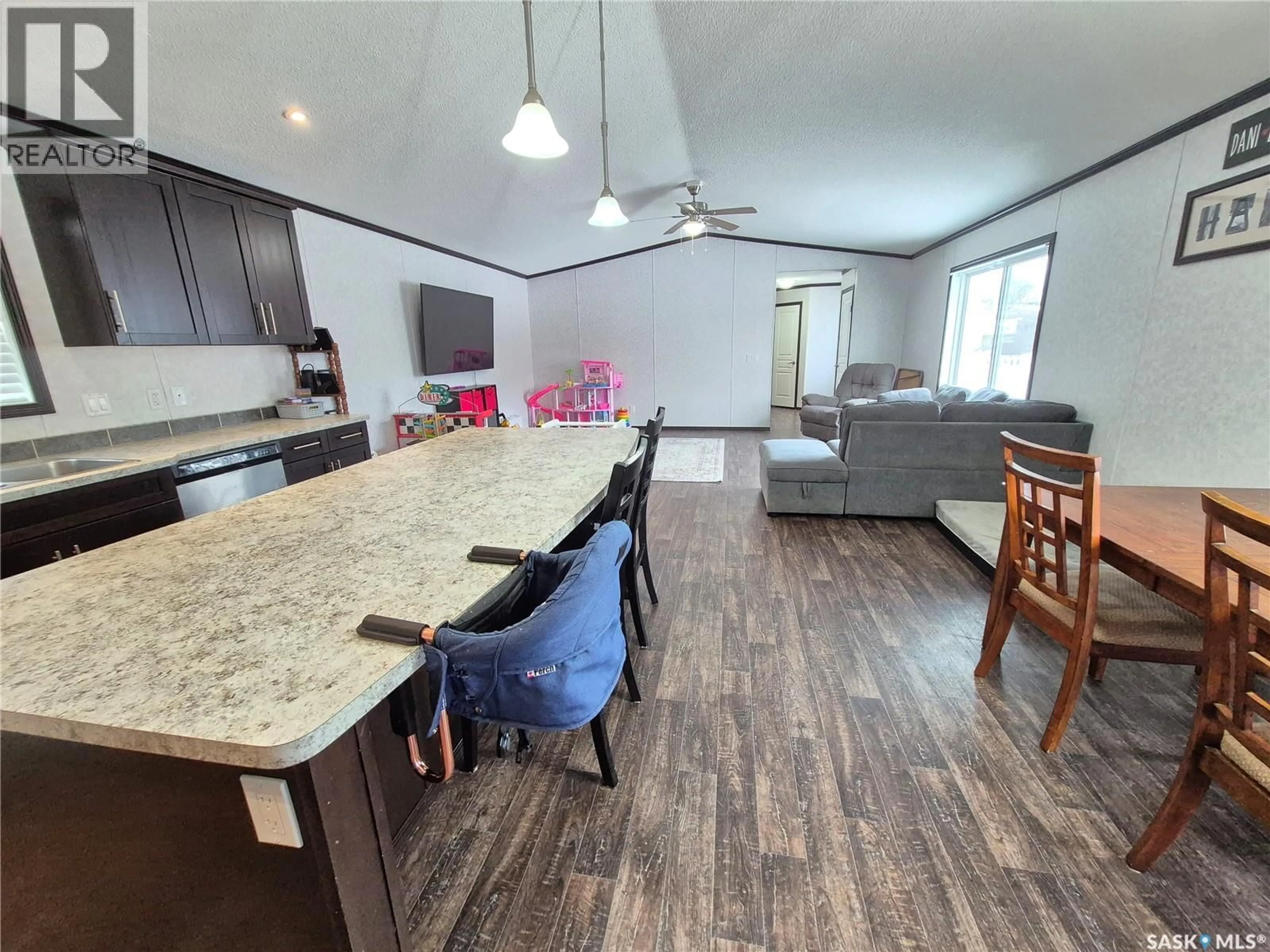 Open concept kitchen, wood/laminate floor for 151 2ND AVENUE, Bengough Saskatchewan S0C0K0
