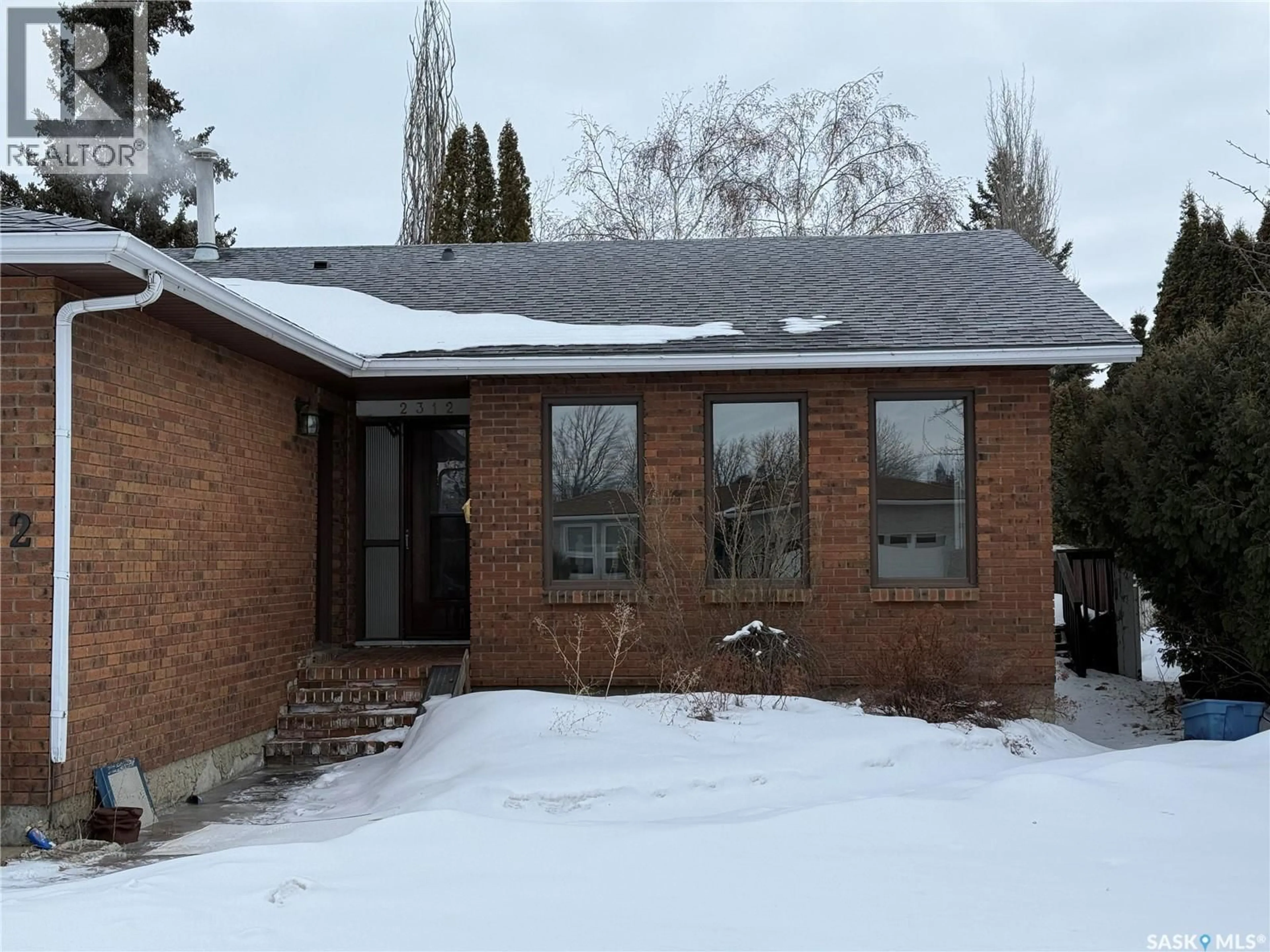 Home with brick exterior material, unknown for 2312 ROBIN PLACE, North Battleford Saskatchewan S9A3T7