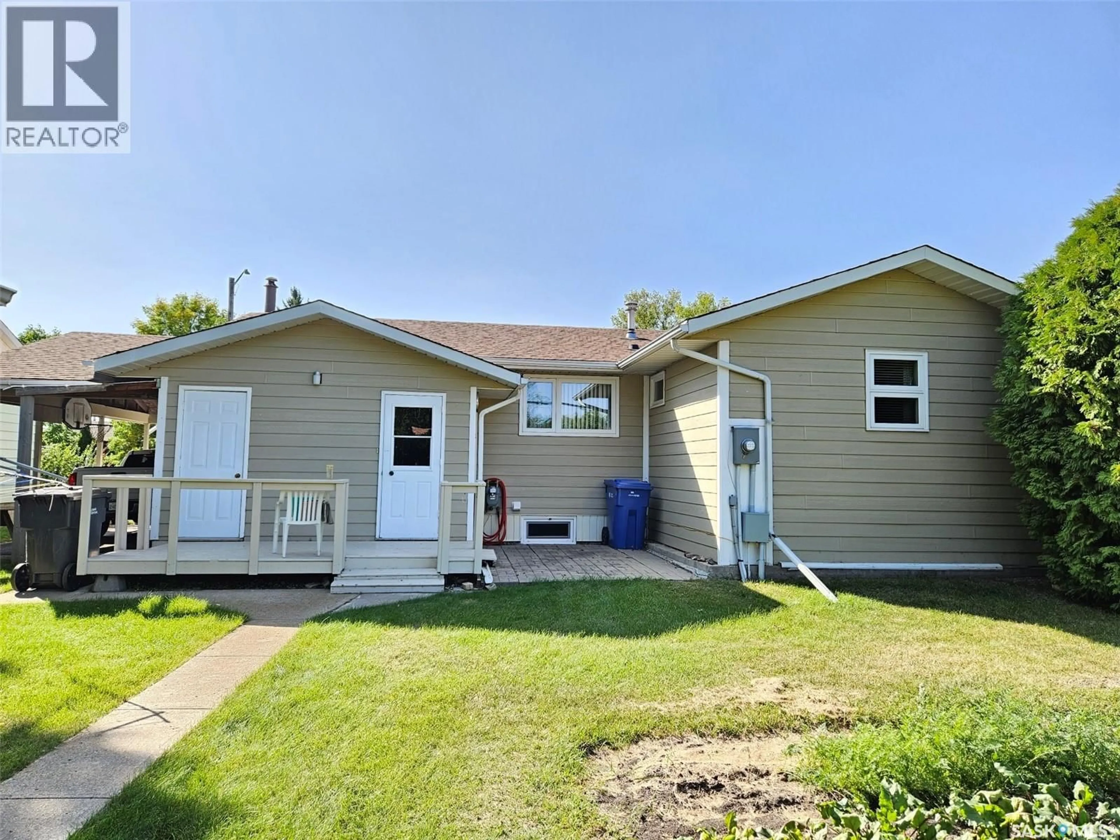 A pic from outside/outdoor area/front of a property/back of a property/a pic from drone, street for 311 6TH STREET, Carlyle Saskatchewan S0C0R0