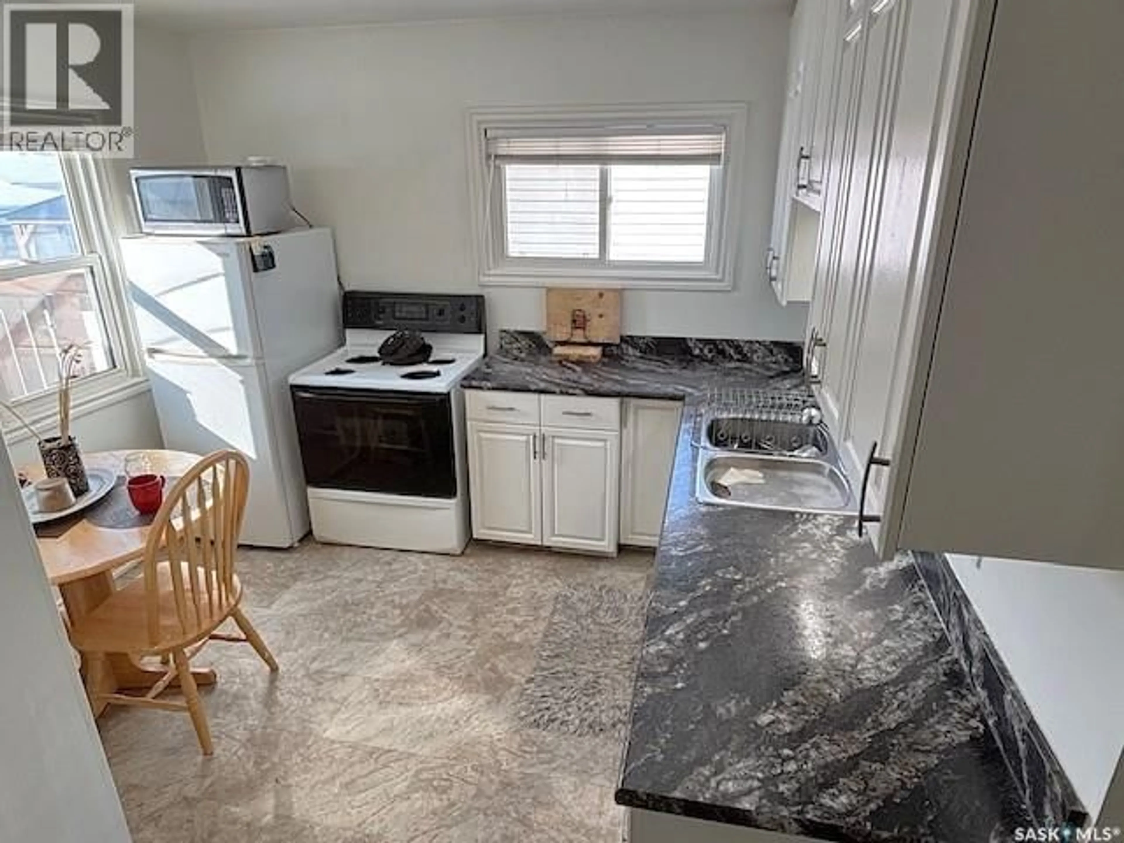 Standard kitchen, ceramic/tile floor for 569 OMINICA STREET, Moose Jaw Saskatchewan S6H0H2