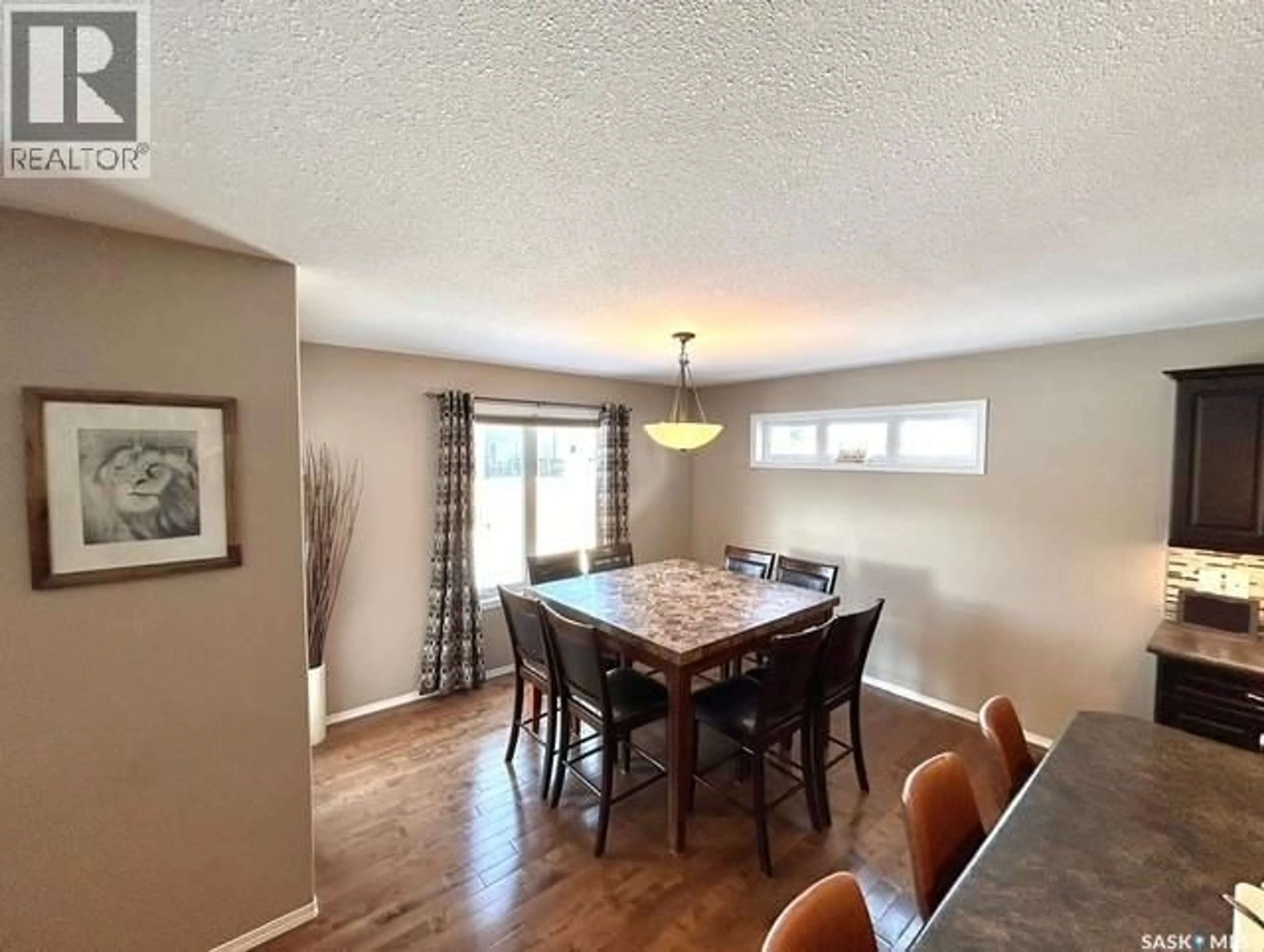 Dining room, wood/laminate floor for 5245 CANUCK CRESCENT, Regina Saskatchewan S4S7K4