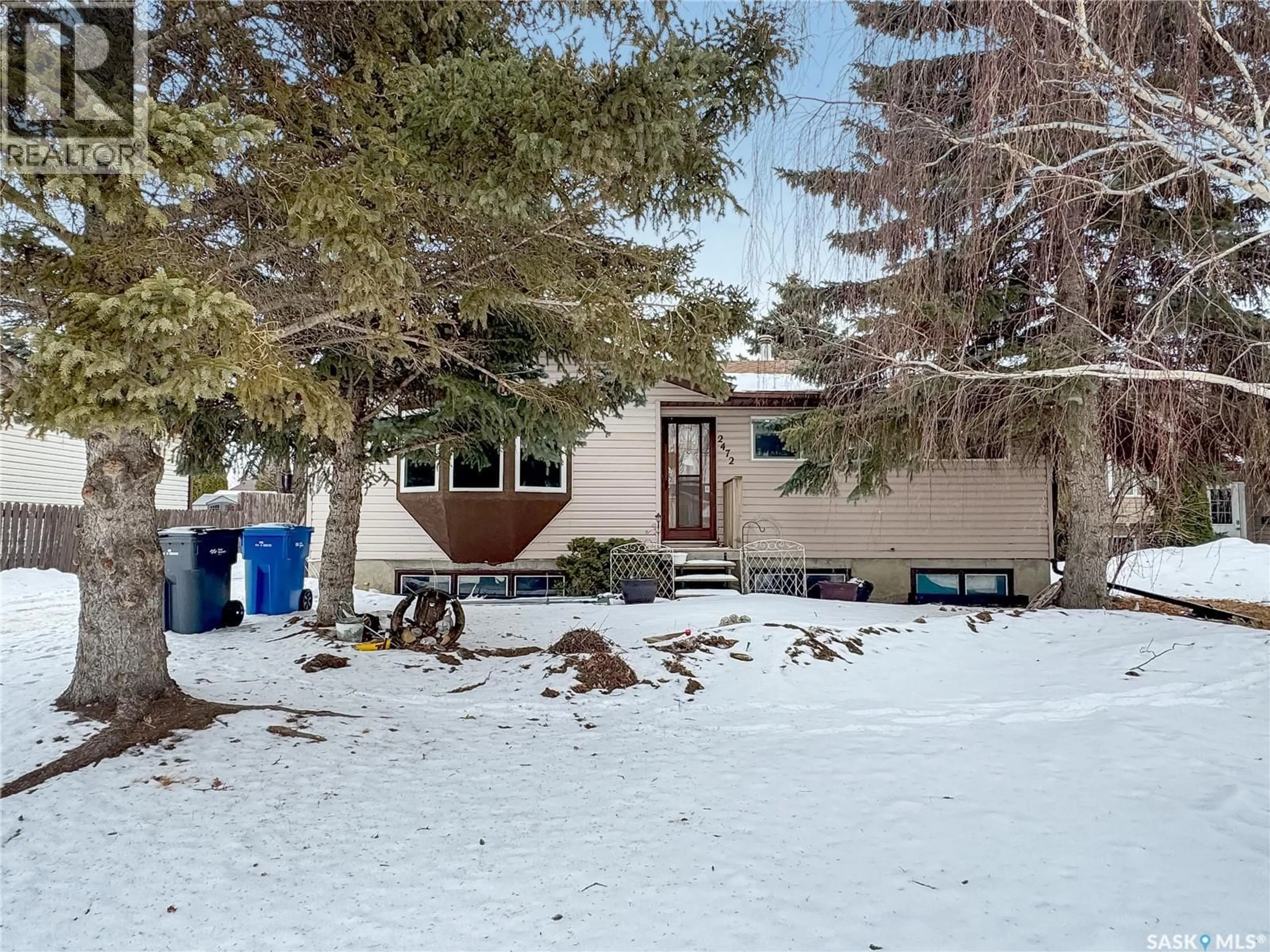 A pic from outside/outdoor area/front of a property/back of a property/a pic from drone, street for 2472 ROSS CRESCENT, North Battleford Saskatchewan S9A3R3