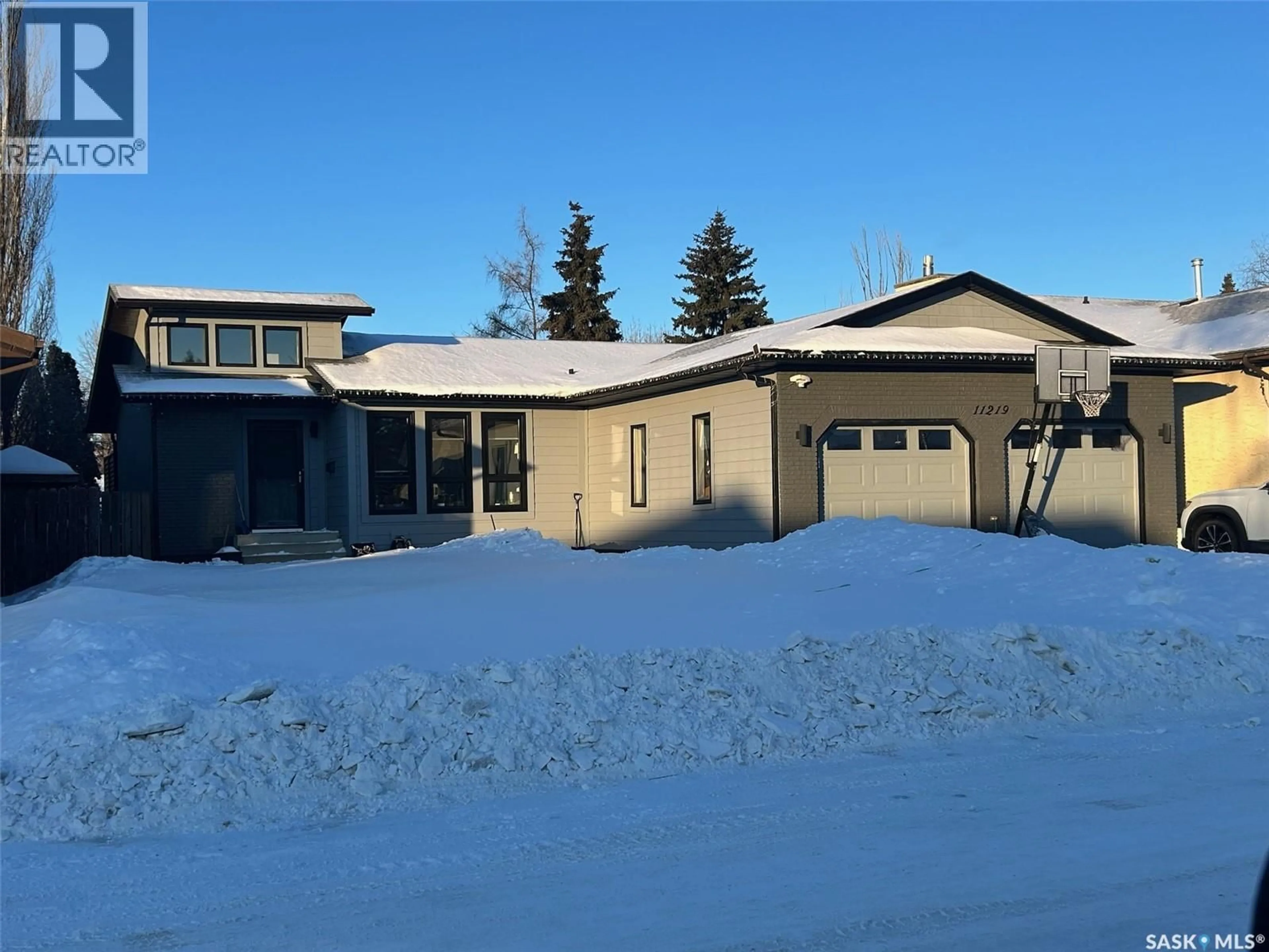 Home with vinyl exterior material, street for 11219 GARDINER DRIVE, North Battleford Saskatchewan S9A3M5