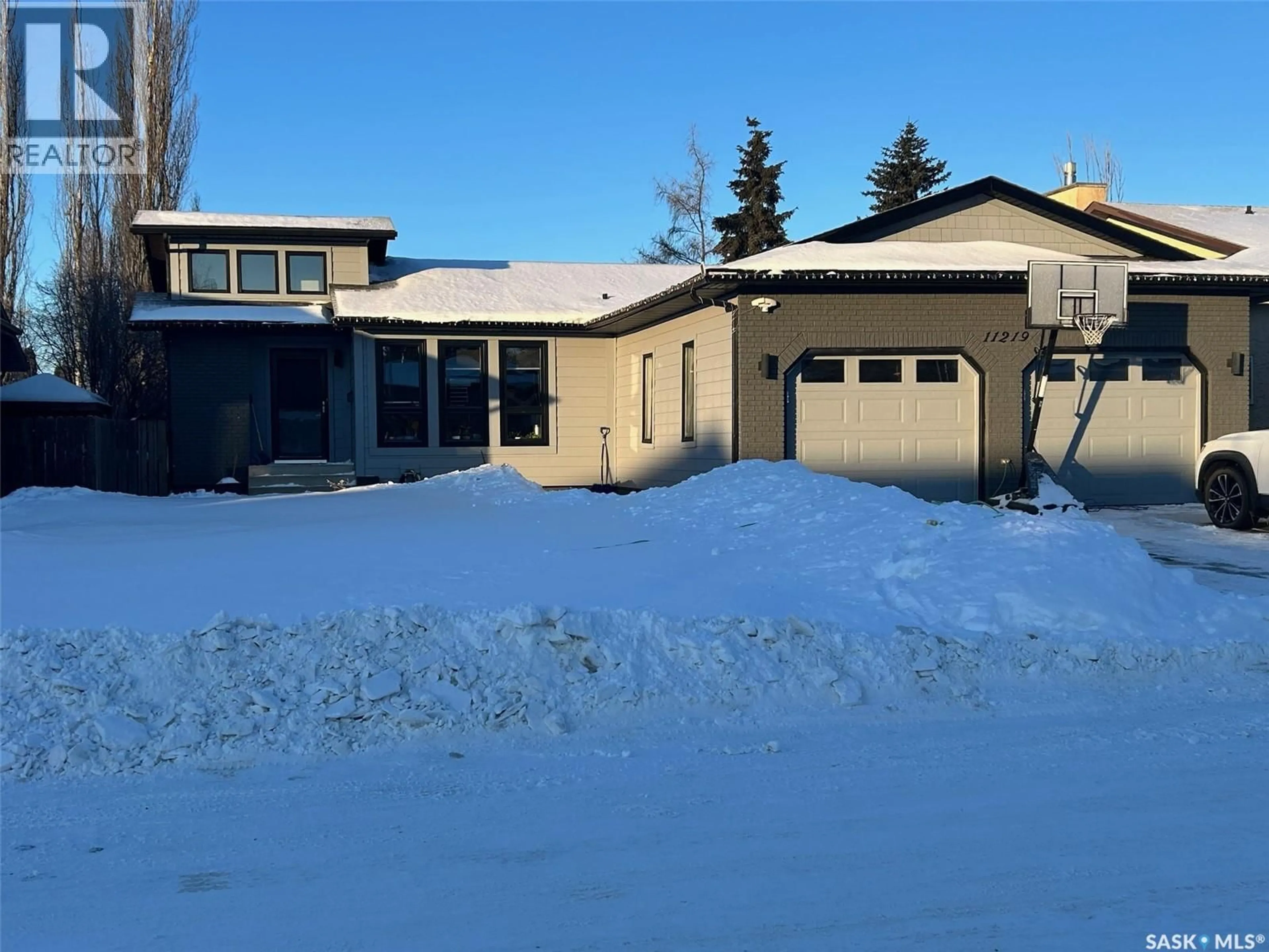 A pic from outside/outdoor area/front of a property/back of a property/a pic from drone, street for 11219 GARDINER DRIVE, North Battleford Saskatchewan S9A3M5
