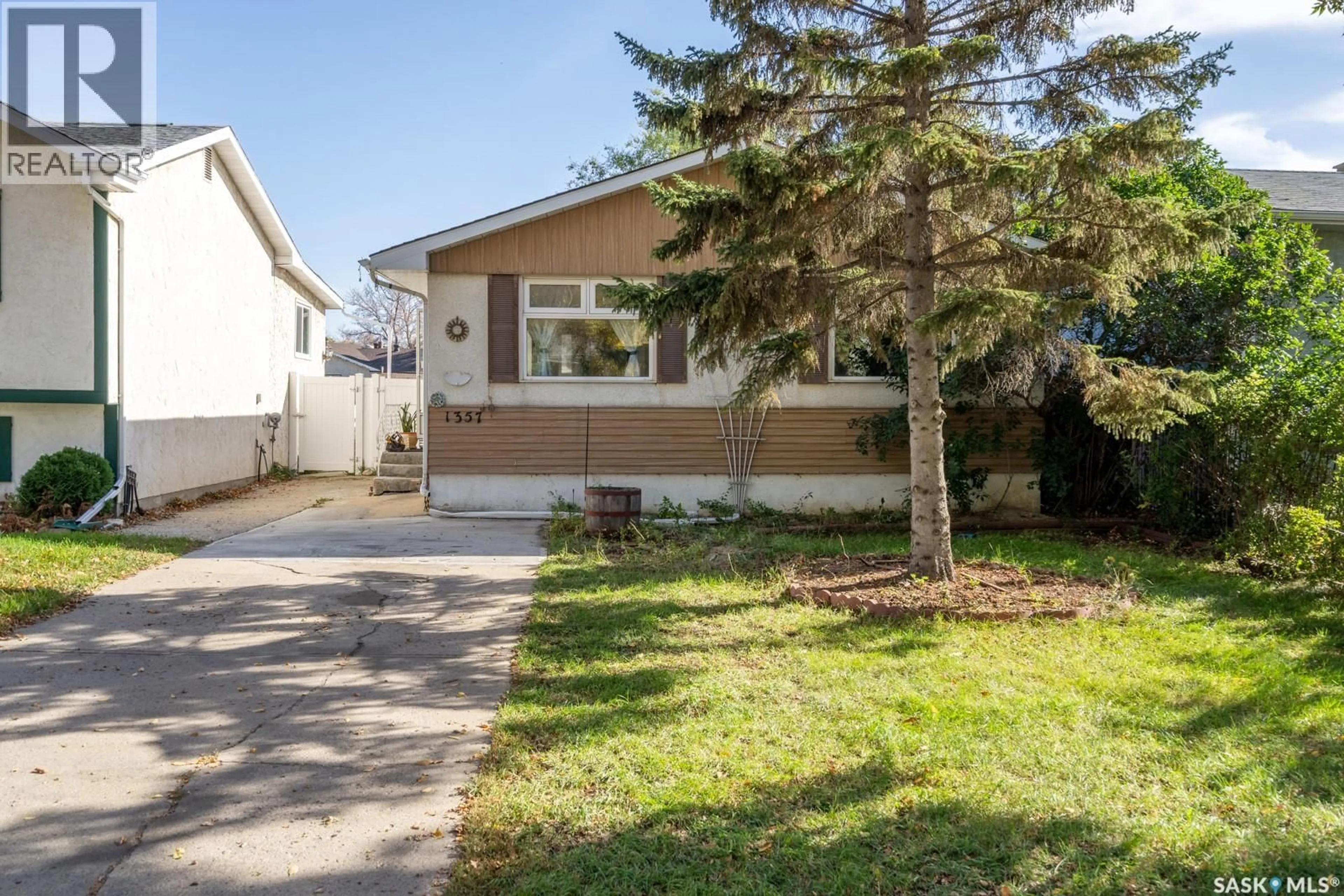 Home with vinyl exterior material, street for 1357 GROSVENOR STREET, Regina Saskatchewan S4N1R2