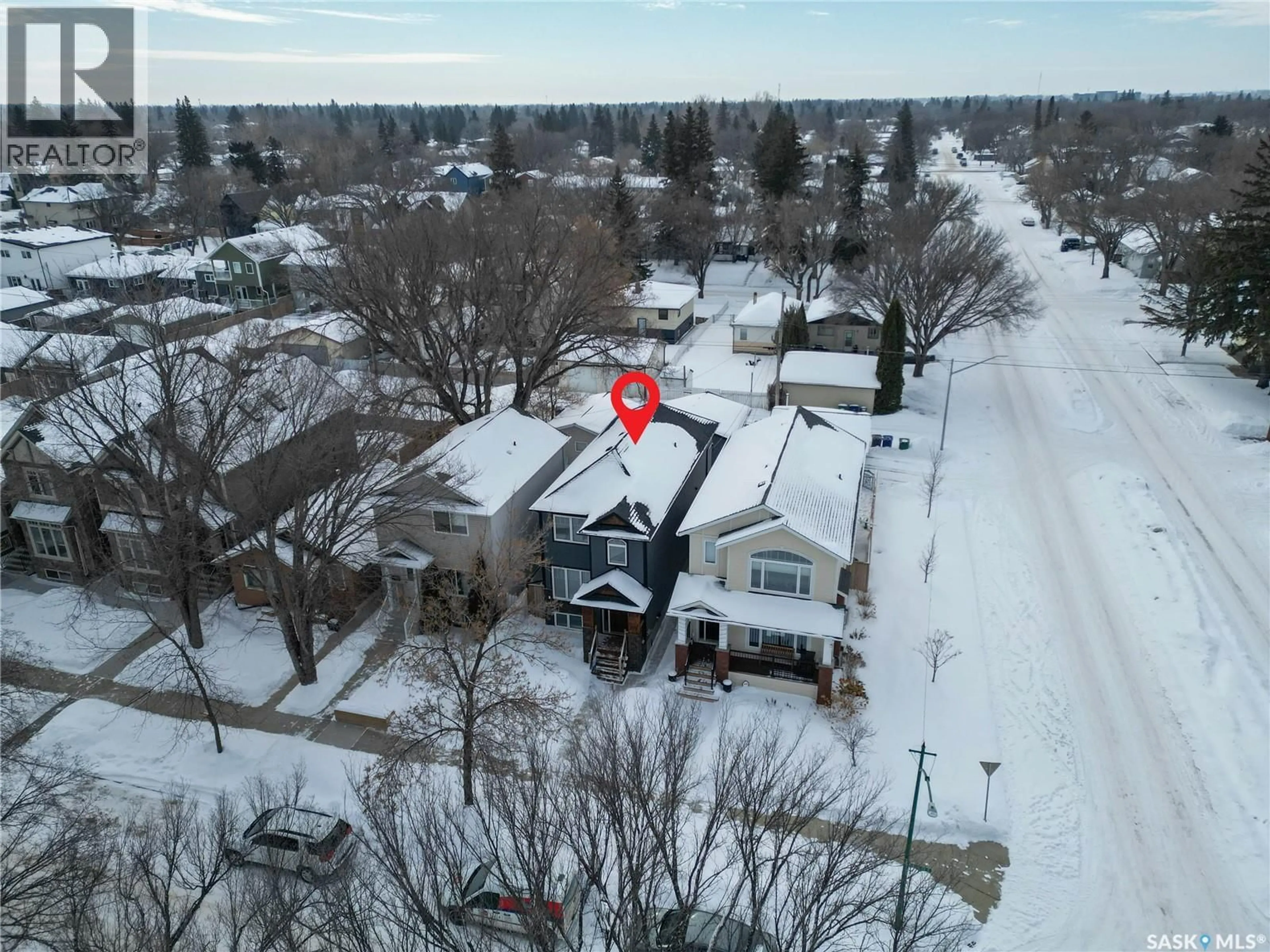 A pic from outside/outdoor area/front of a property/back of a property/a pic from drone, street for 304 3RD STREET, Saskatoon Saskatchewan S7H1L5