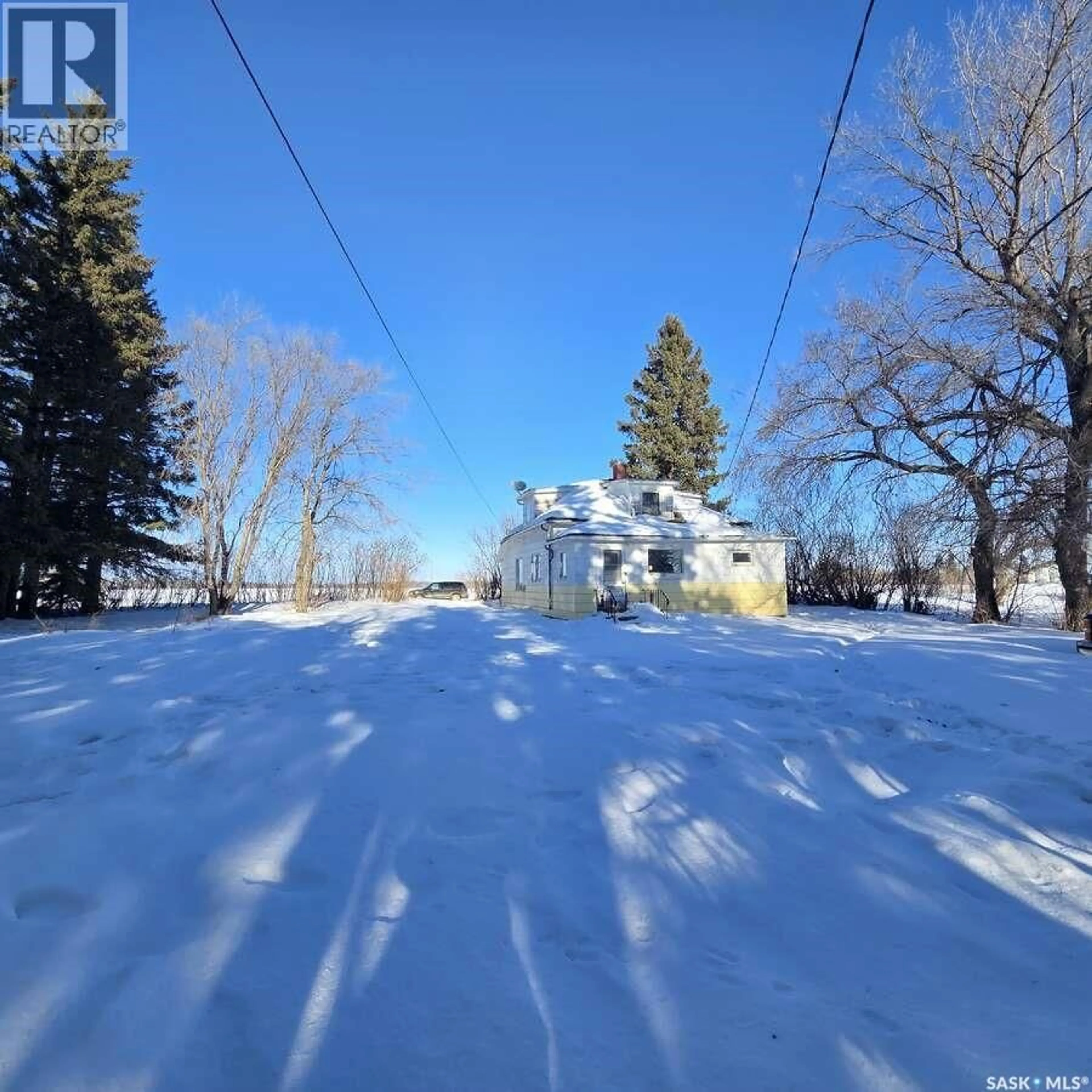 A pic from outside/outdoor area/front of a property/back of a property/a pic from drone, street for 128 RAILWAY AVENUE, Margo Saskatchewan S0A2M0