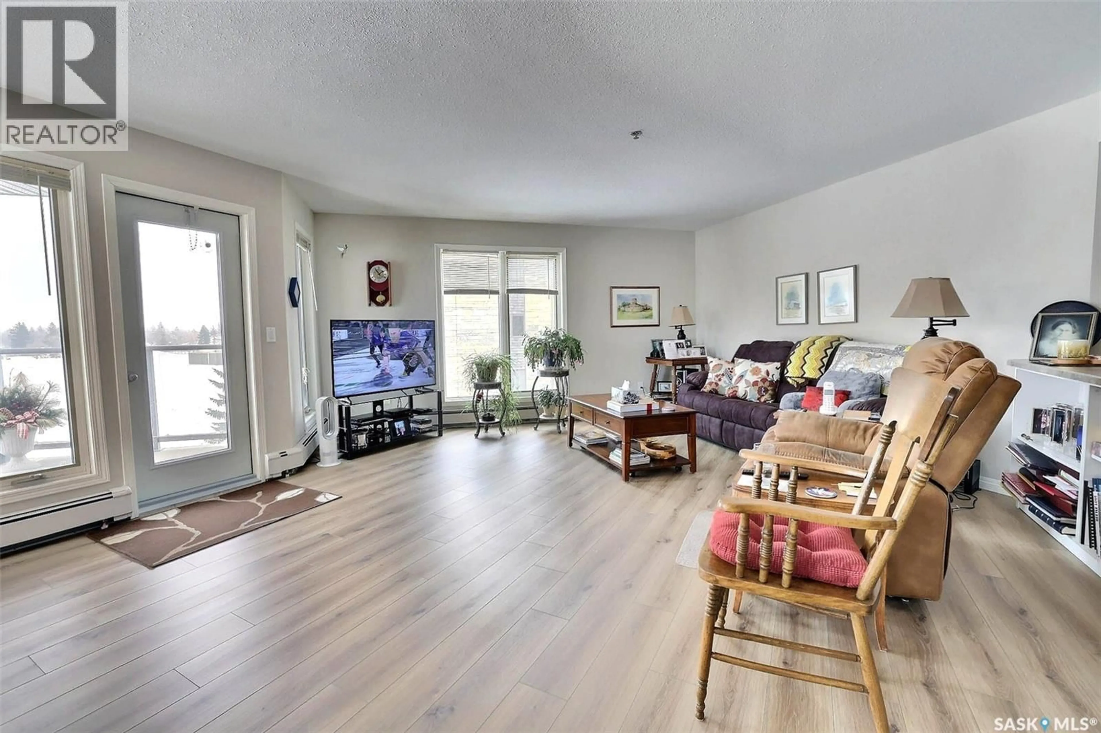Living room with furniture, wood/laminate floor for 341 3605 ALBERT STREET, Regina Saskatchewan S4S7L4
