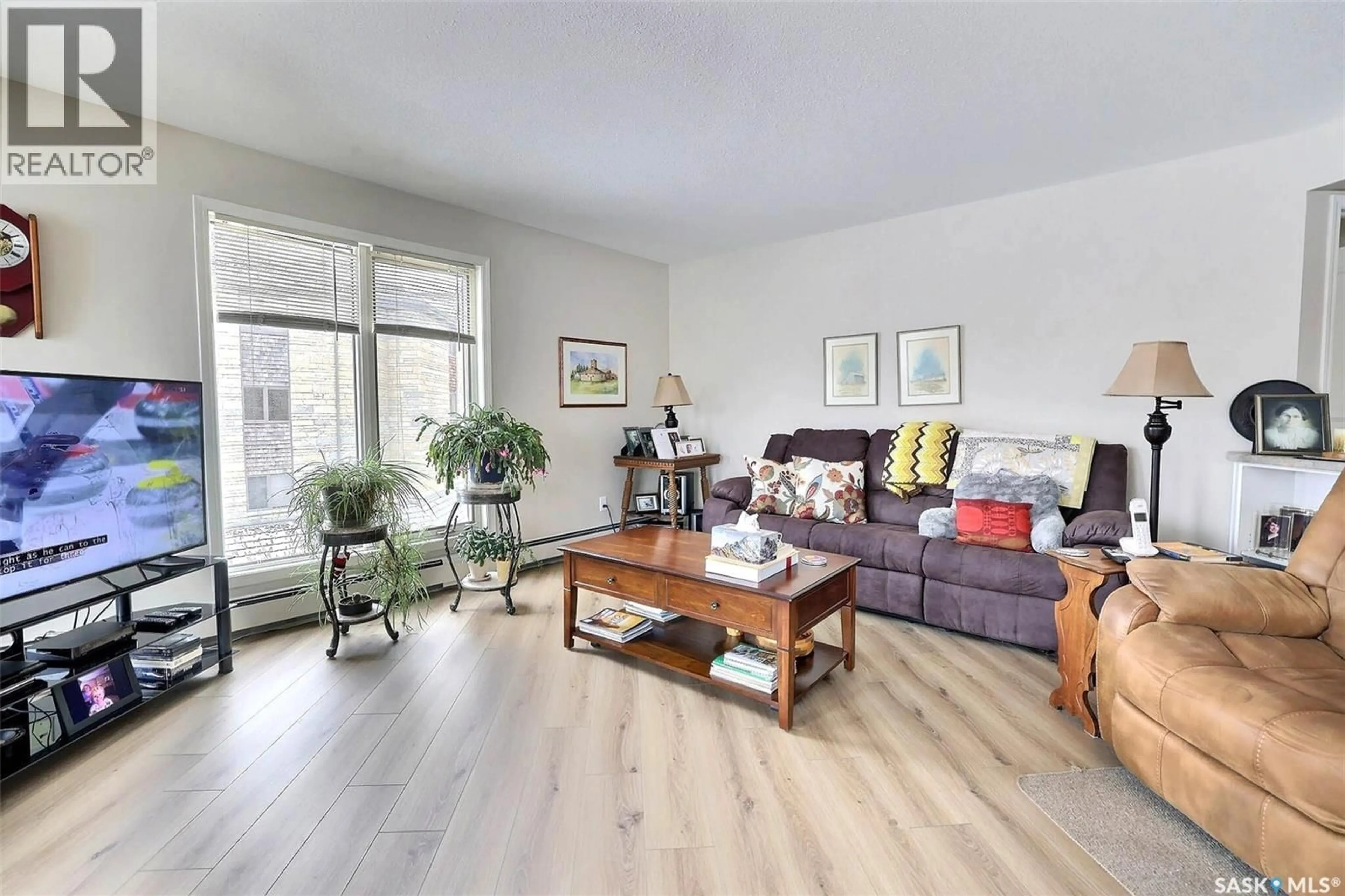 Living room with furniture, wood/laminate floor for 341 3605 ALBERT STREET, Regina Saskatchewan S4S7L4