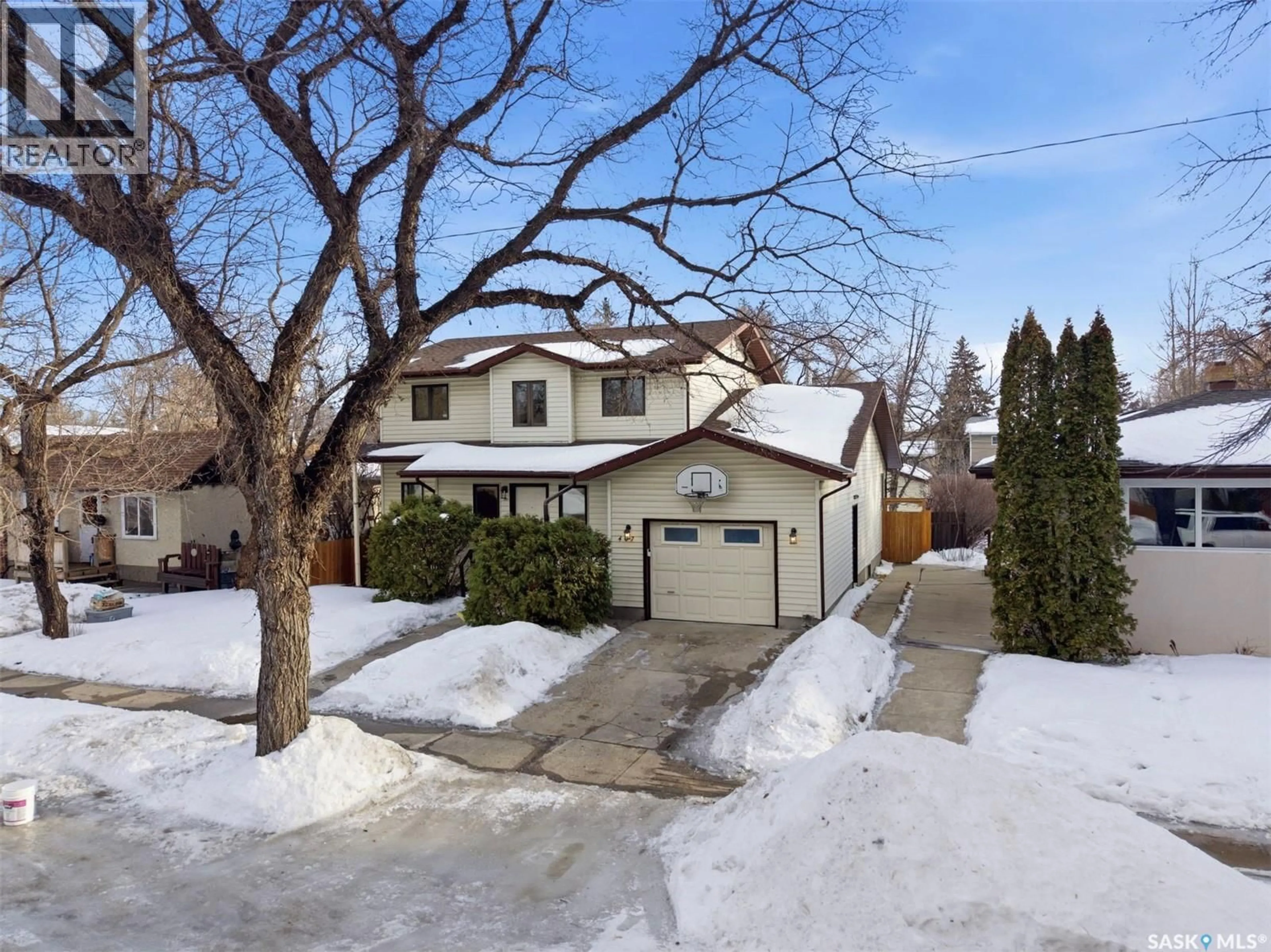 A pic from outside/outdoor area/front of a property/back of a property/a pic from drone, street for 407 111TH STREET, Saskatoon Saskatchewan S7N1T6