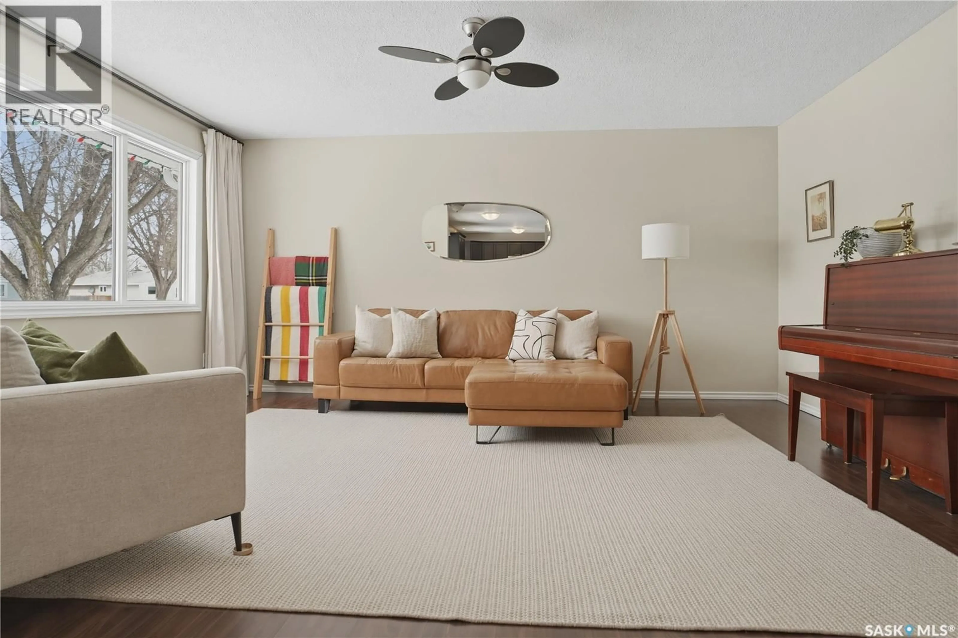 Living room with furniture, carpet floor for 2062 96TH STREET, North Battleford Saskatchewan S9A0J4