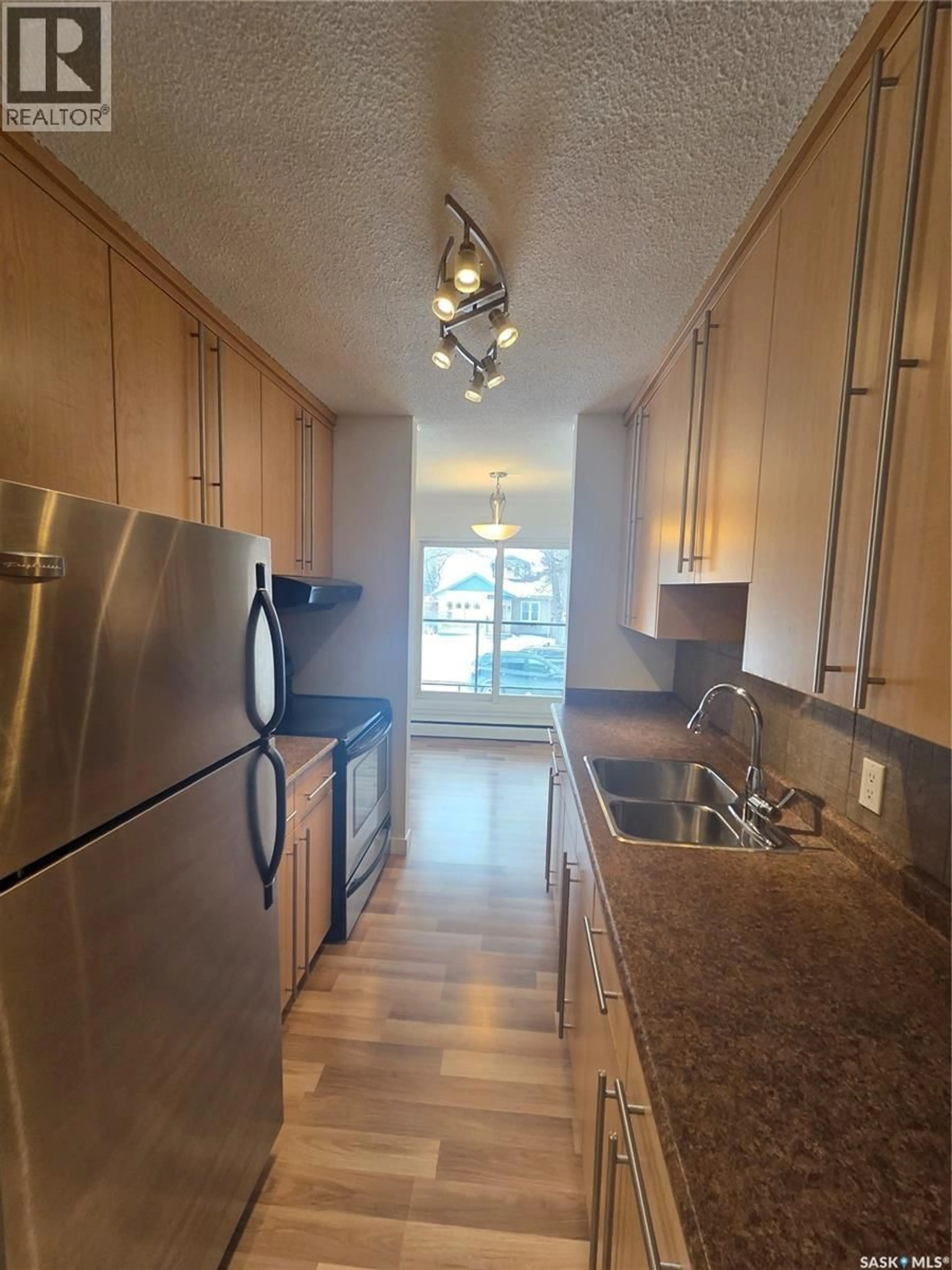 Standard kitchen, wood/laminate floor for N - 7 833 B AVENUE, Saskatoon Saskatchewan S7L1E5