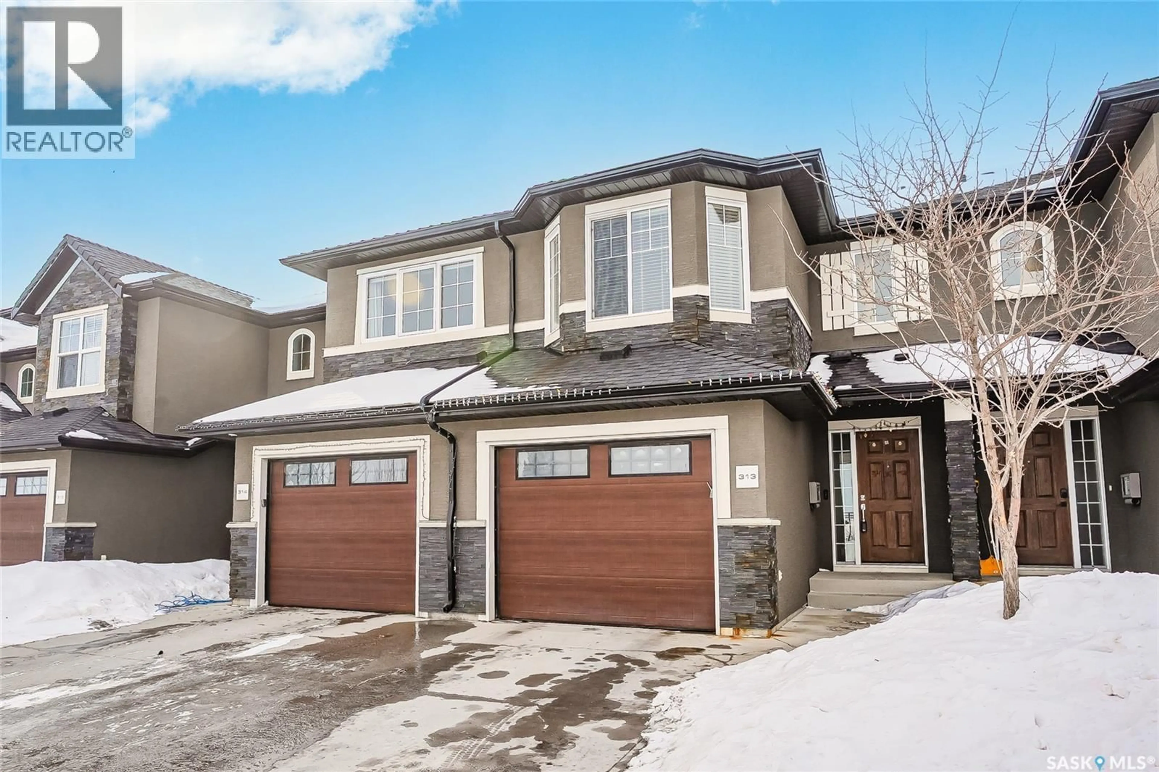 Home with brick exterior material, street for 1303 - 313 PATON CRESCENT, Saskatoon Saskatchewan S7W0P6