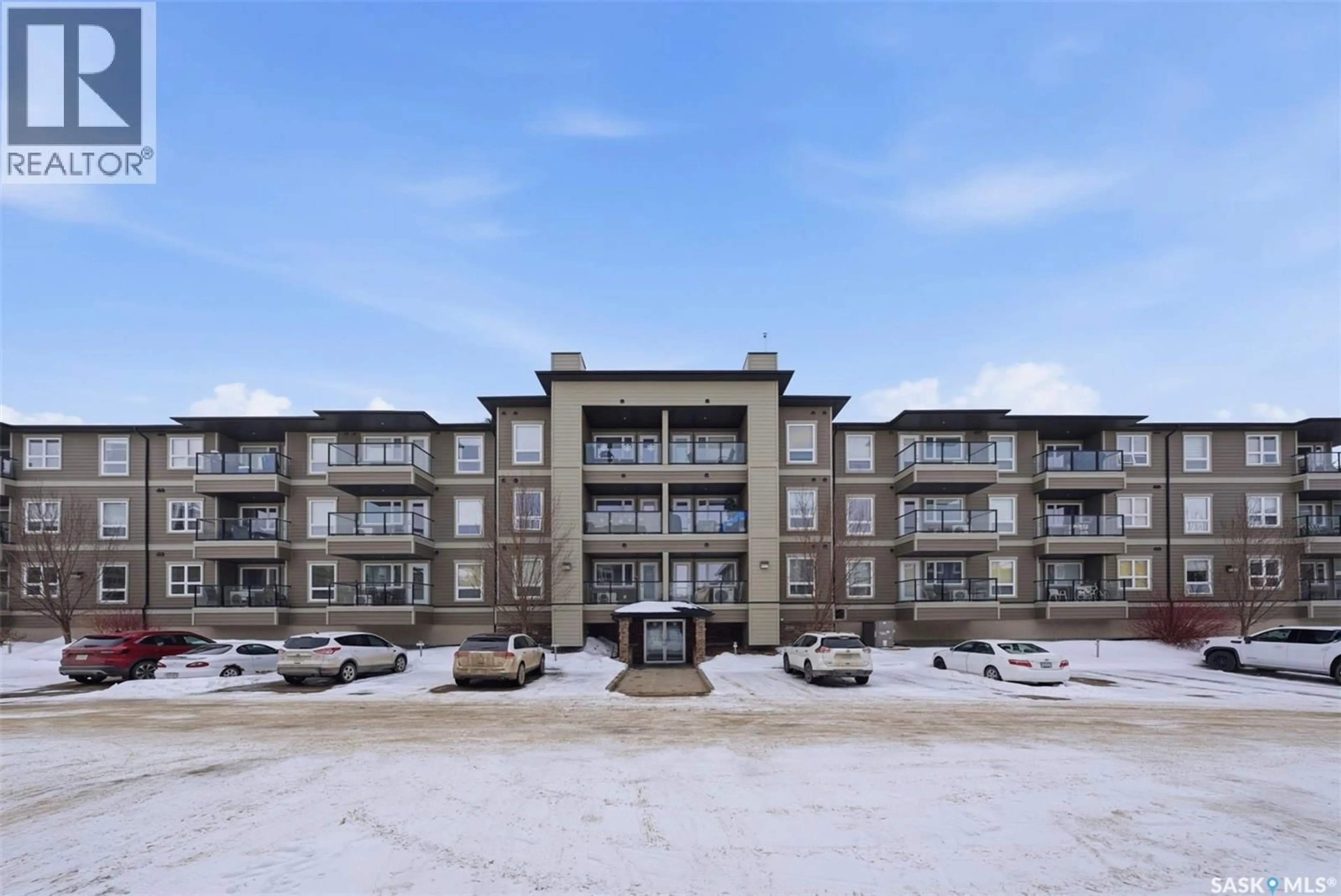 A pic from outside/outdoor area/front of a property/back of a property/a pic from drone, building for 110 - 5107 WILLIS CRESCENT, Saskatoon Saskatchewan S7T0N5