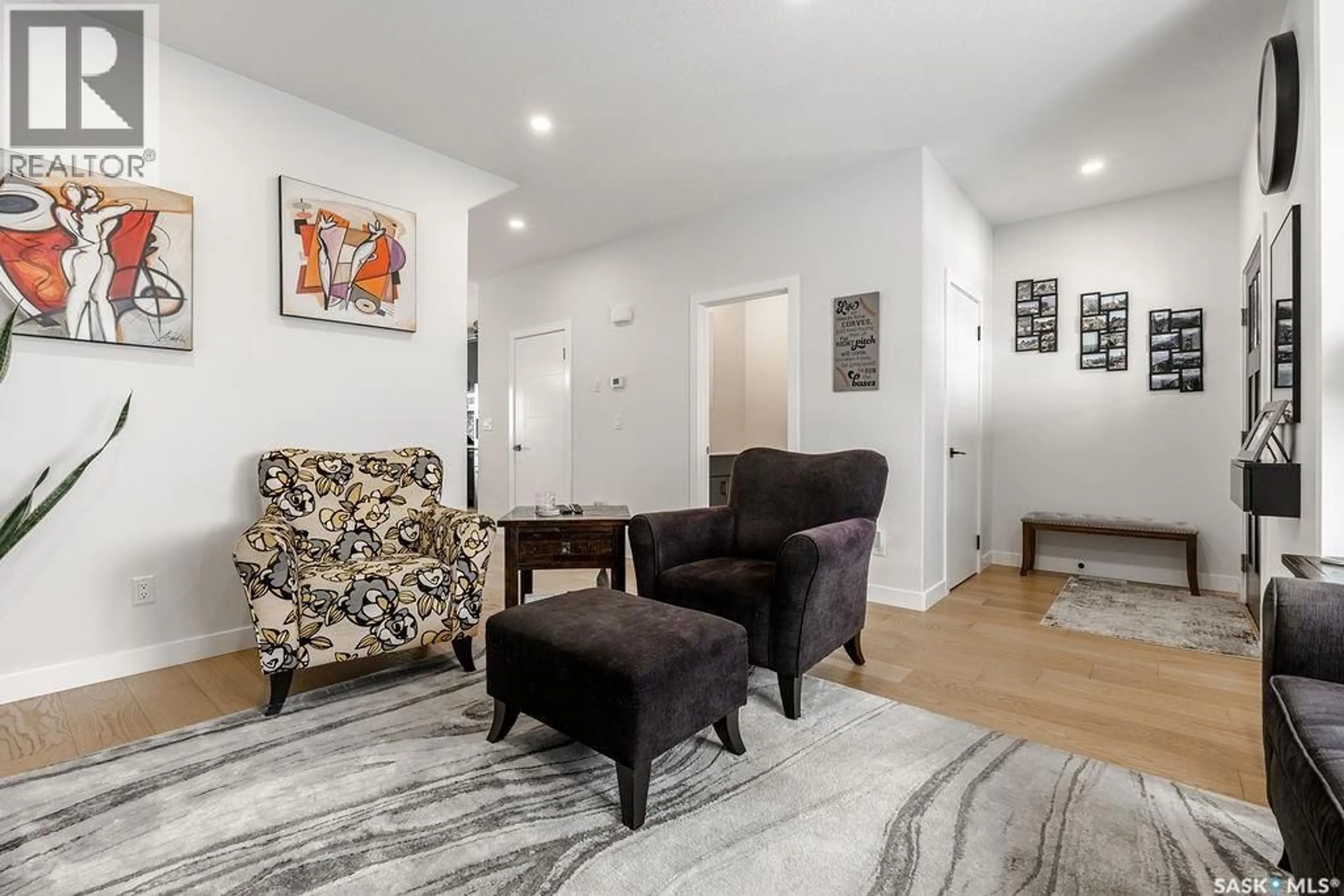 Living room with furniture, unknown for 241 FEHEREGYHAZI BOULEVARD, Saskatoon Saskatchewan S7W0C2