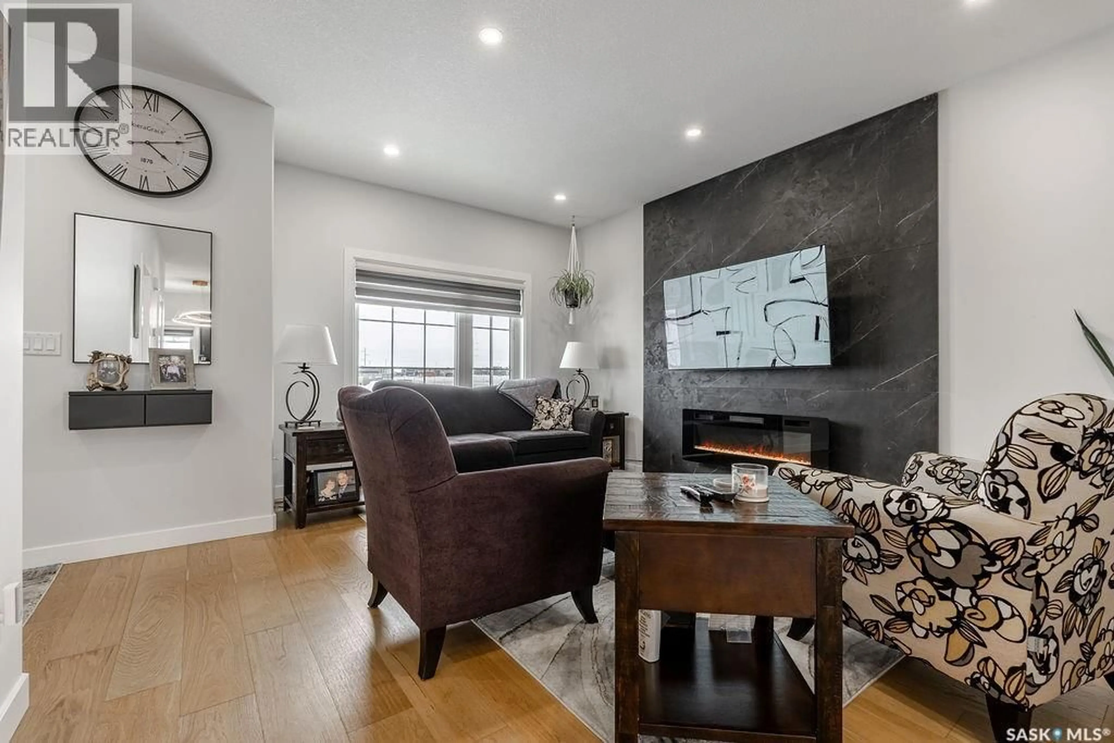 Living room with furniture, unknown for 241 FEHEREGYHAZI BOULEVARD, Saskatoon Saskatchewan S7W0C2