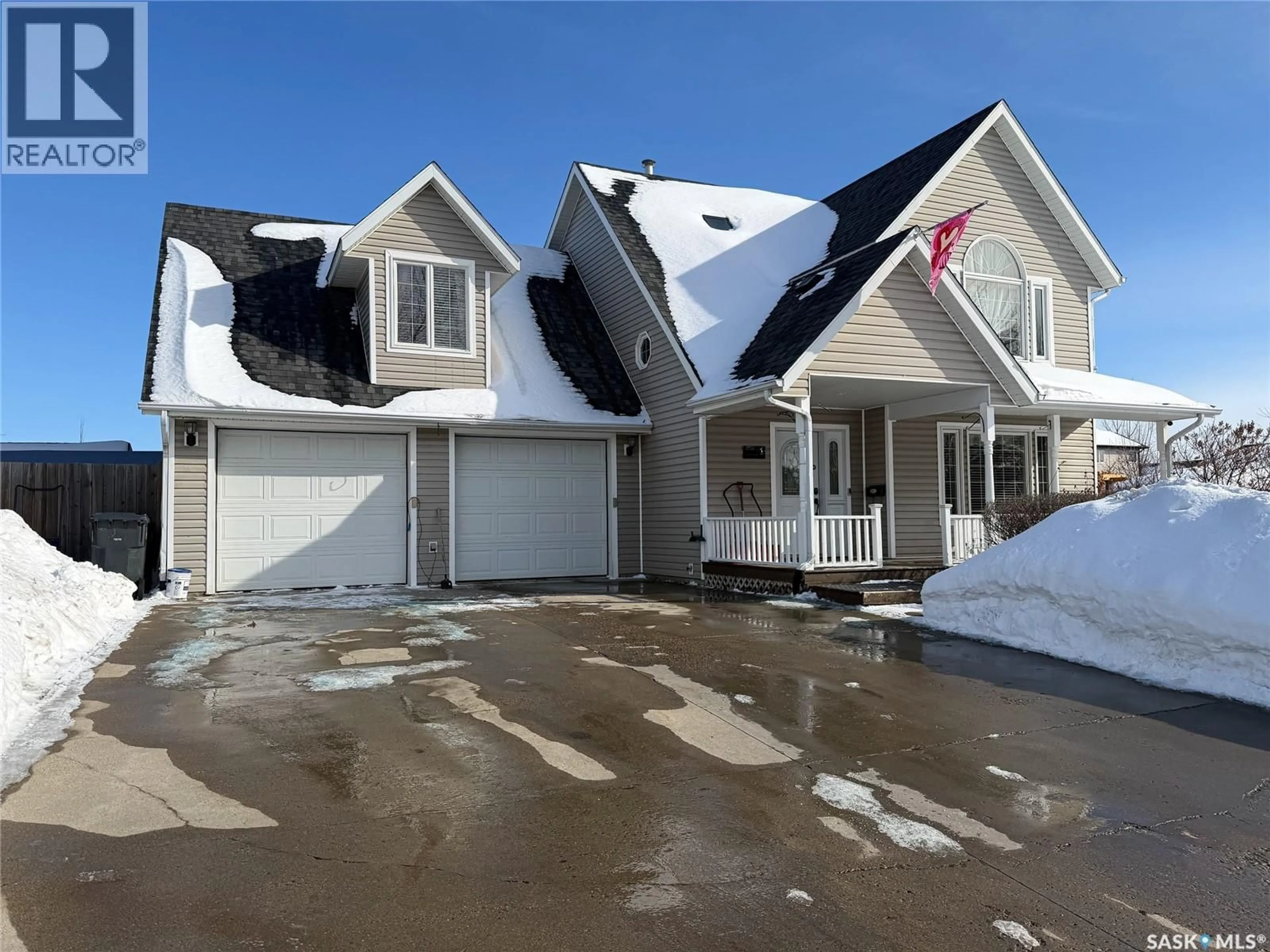 Home with vinyl exterior material, street for 1 MORIN CRESCENT, Meadow Lake Saskatchewan S9X1Z8