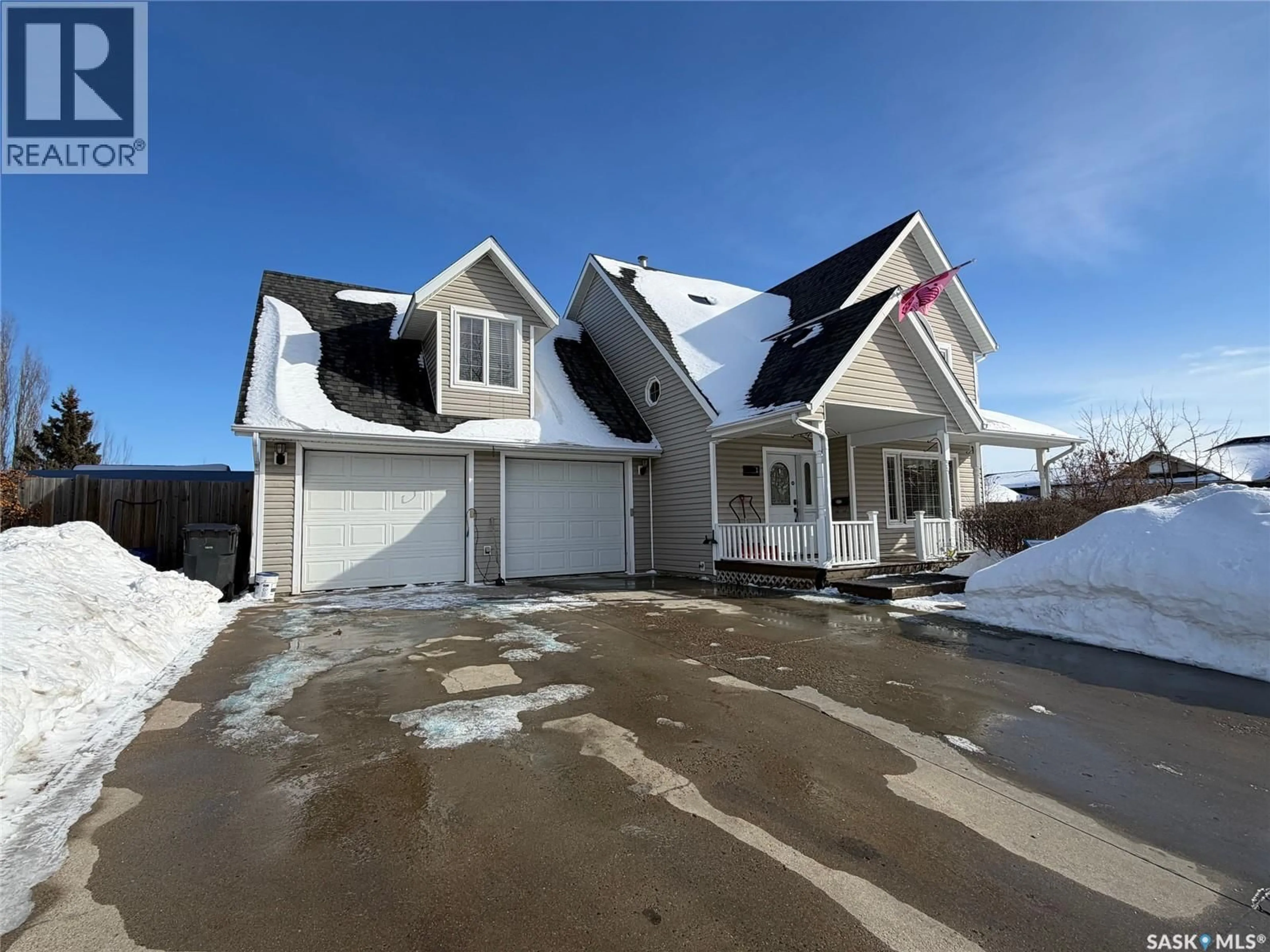 Home with vinyl exterior material, street for 1 MORIN CRESCENT, Meadow Lake Saskatchewan S9X1Z8