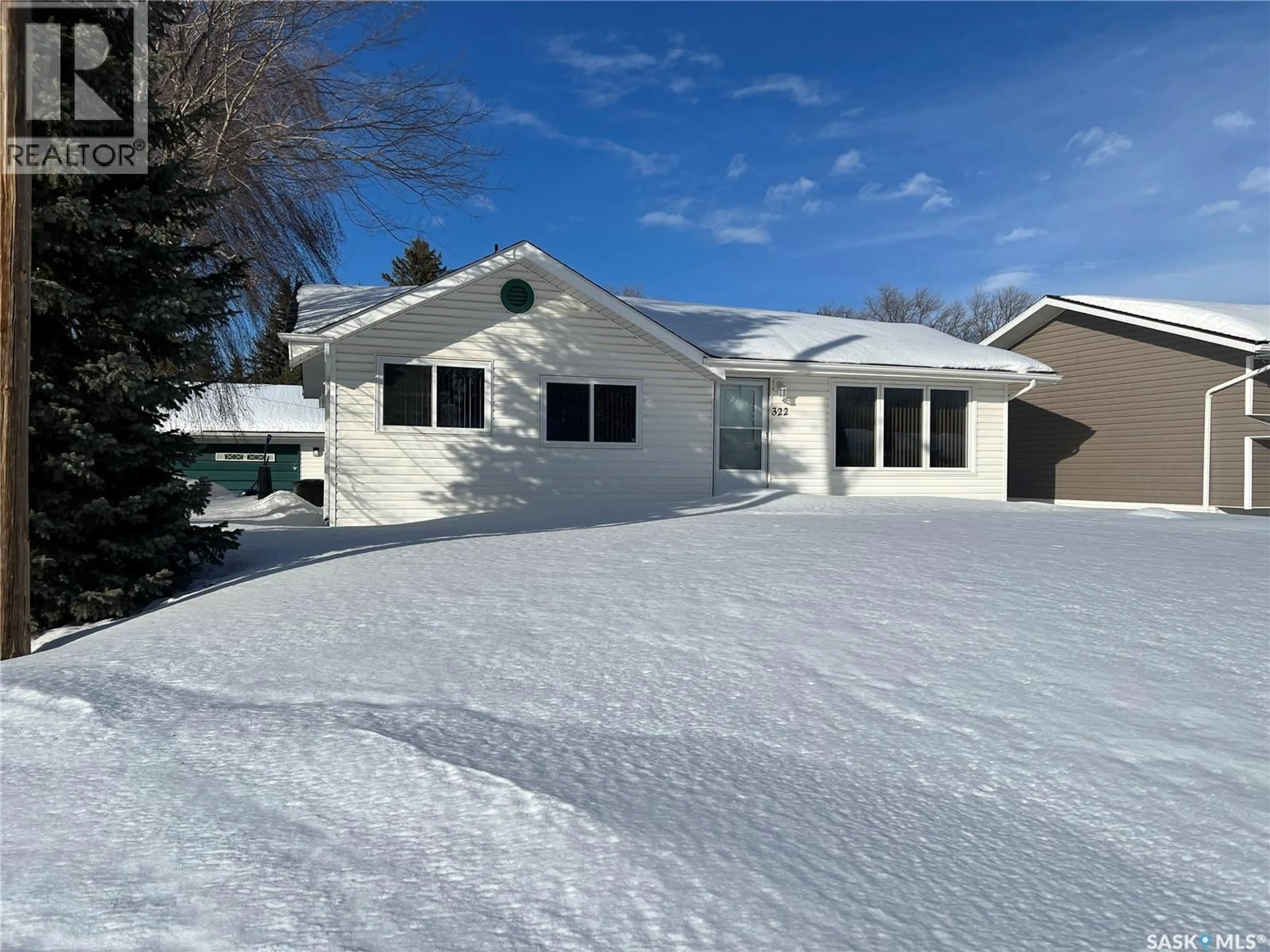 Home with vinyl exterior material, street for 322 OAK STREET, Porcupine Plain Saskatchewan S0E1H0