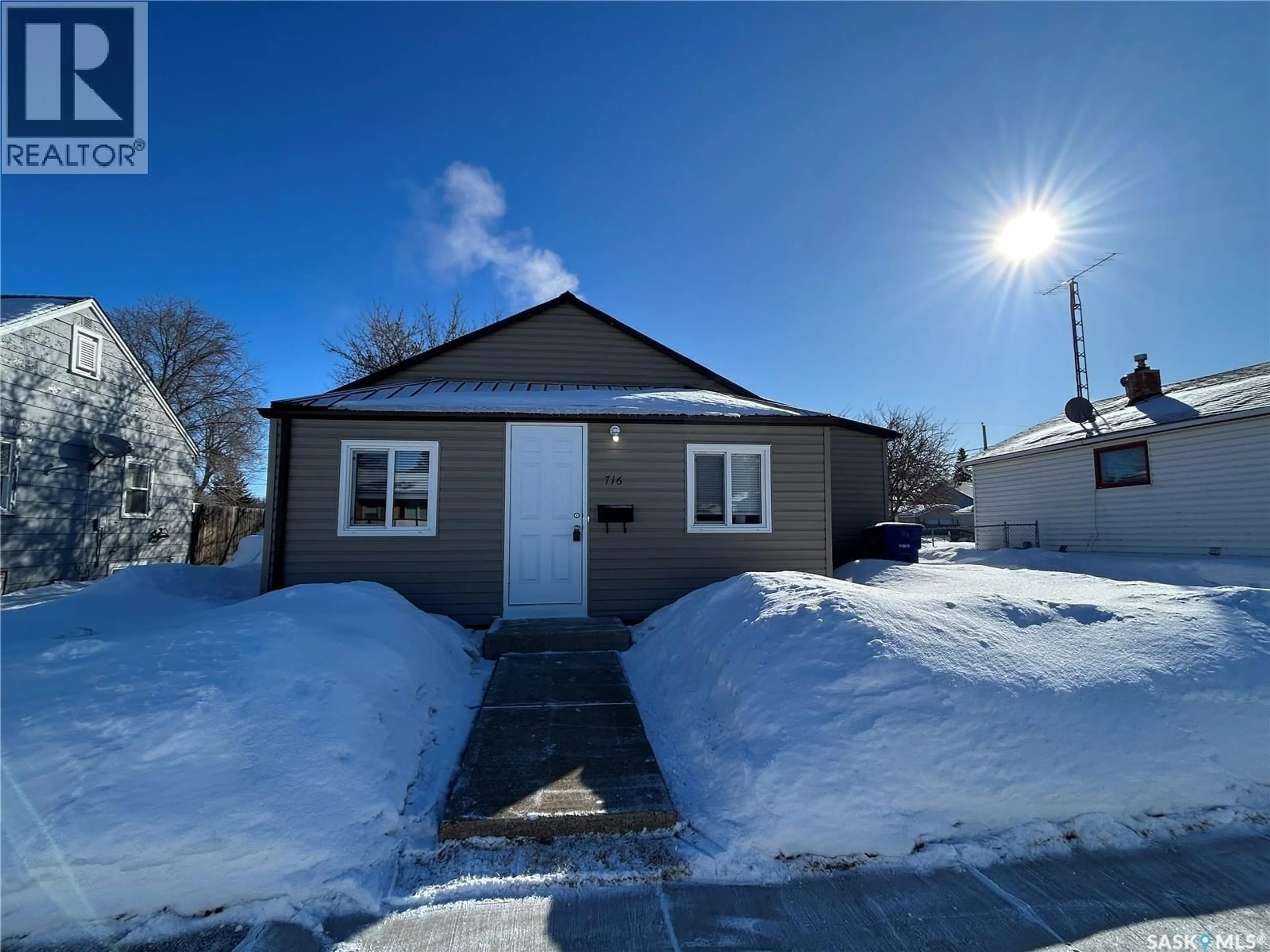 A pic from outside/outdoor area/front of a property/back of a property/a pic from drone, street for 716 14TH STREET, Humboldt Saskatchewan S0K2A0