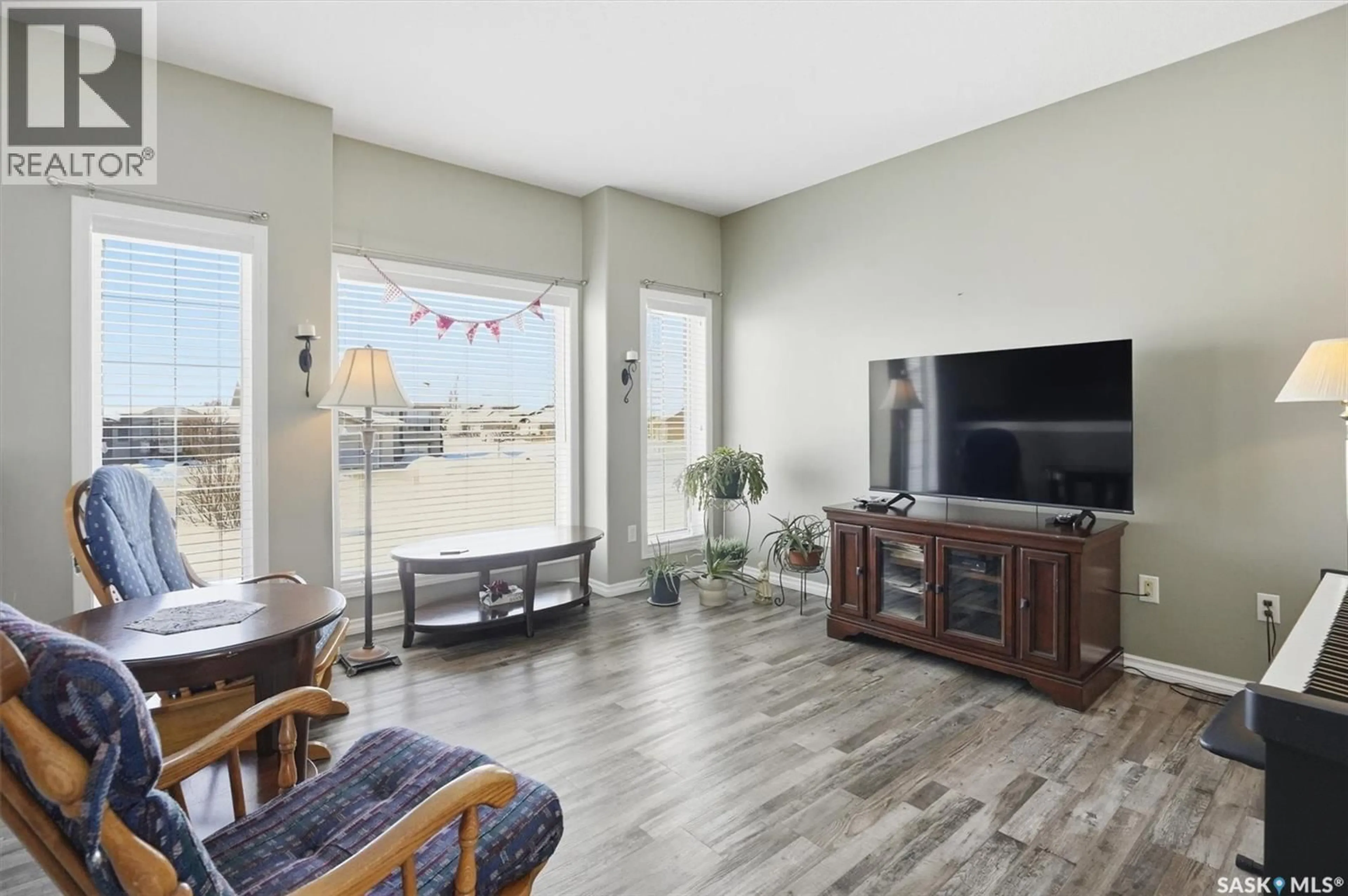 Living room with furniture, unknown for 413 BENDEL CRESCENT, Martensville Saskatchewan S0K2T2