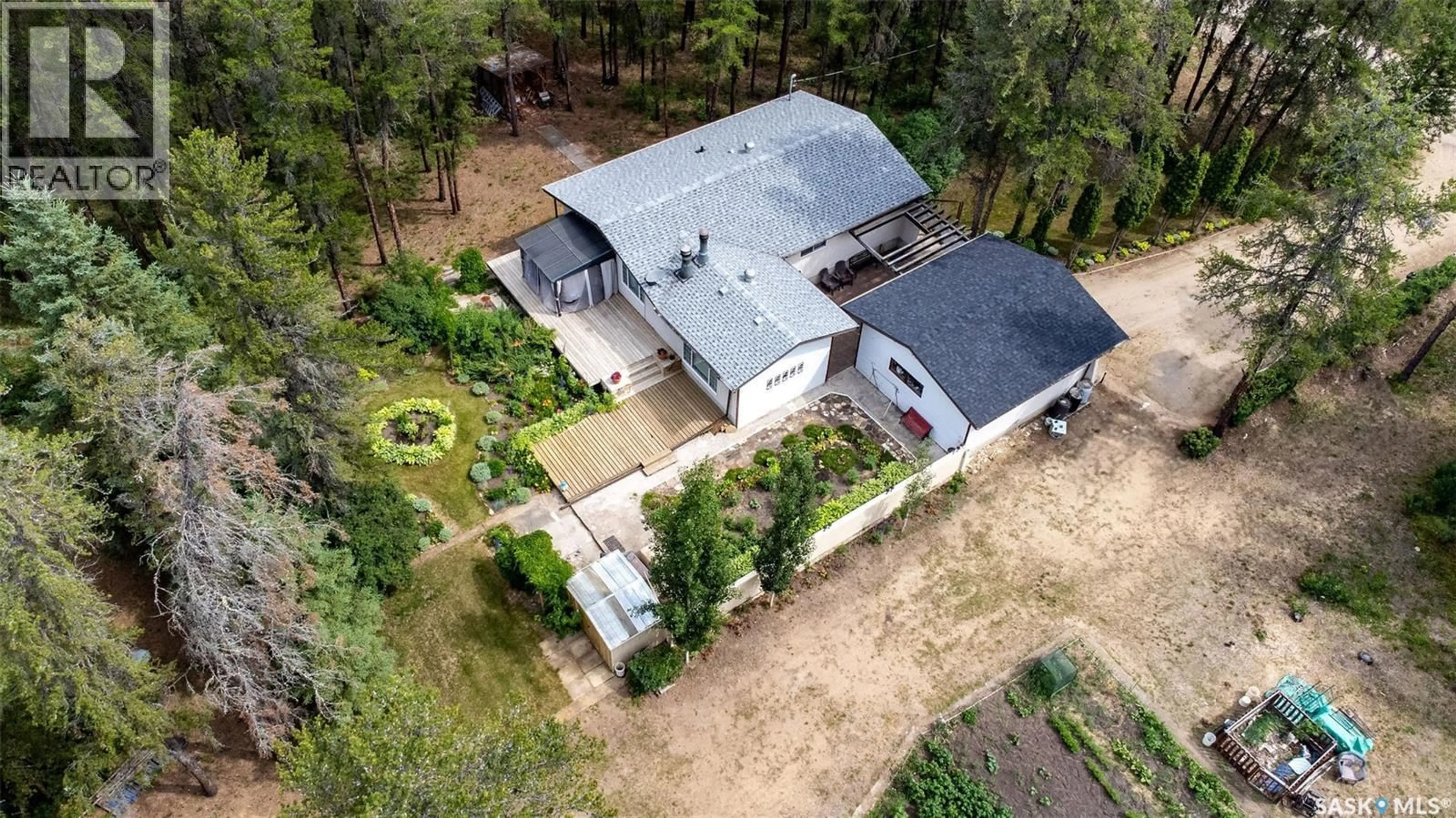 A pic from outside/outdoor area/front of a property/back of a property/a pic from drone, building for 6107 HOLMES DRIVE, Buckland Rm No. 491 Saskatchewan S6V5R3