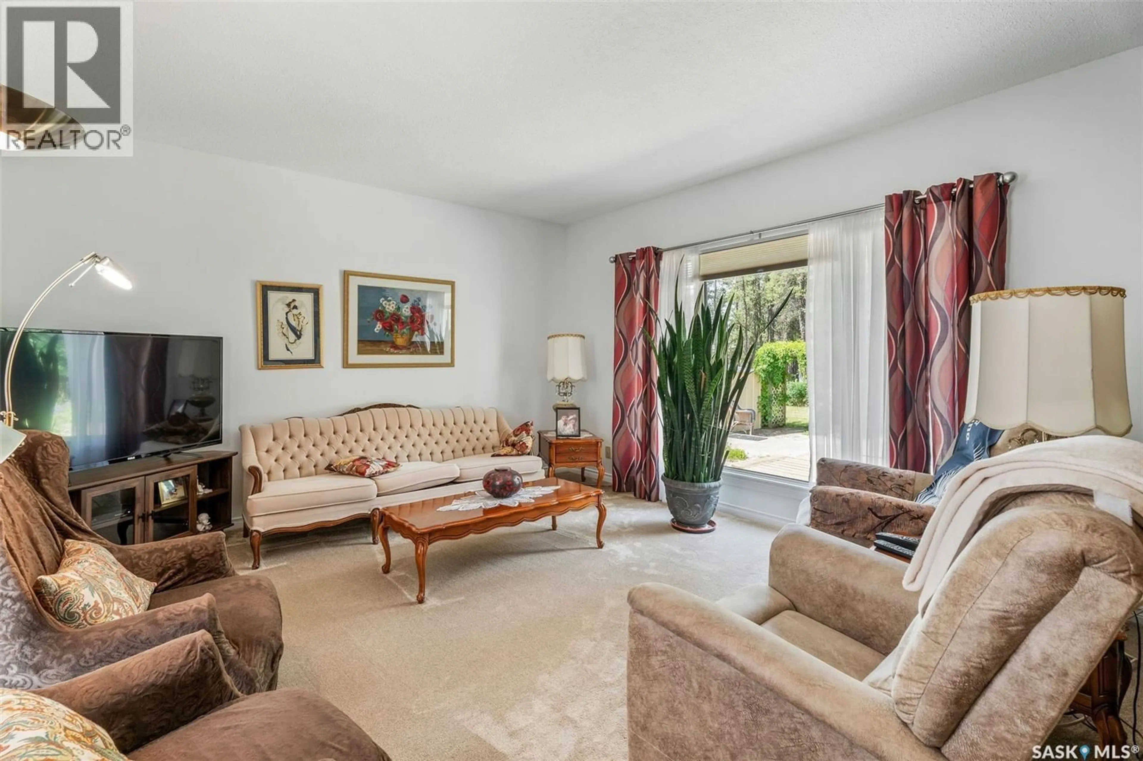 Living room with furniture, unknown for 6107 HOLMES DRIVE, Buckland Rm No. 491 Saskatchewan S6V5R3