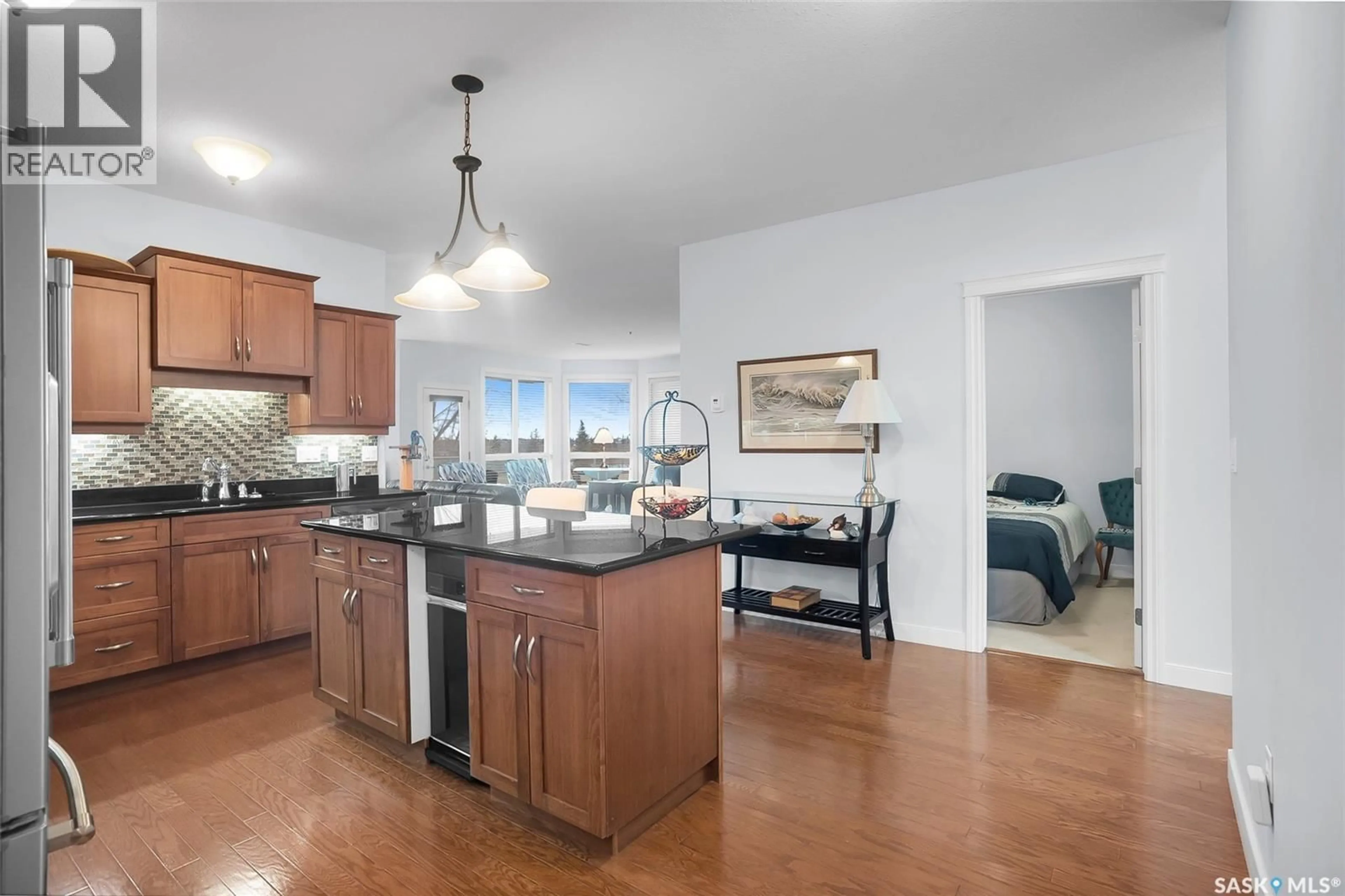 Open concept kitchen, unknown for 204 401 CARTWRIGHT STREET, Saskatoon Saskatchewan S7T0B3