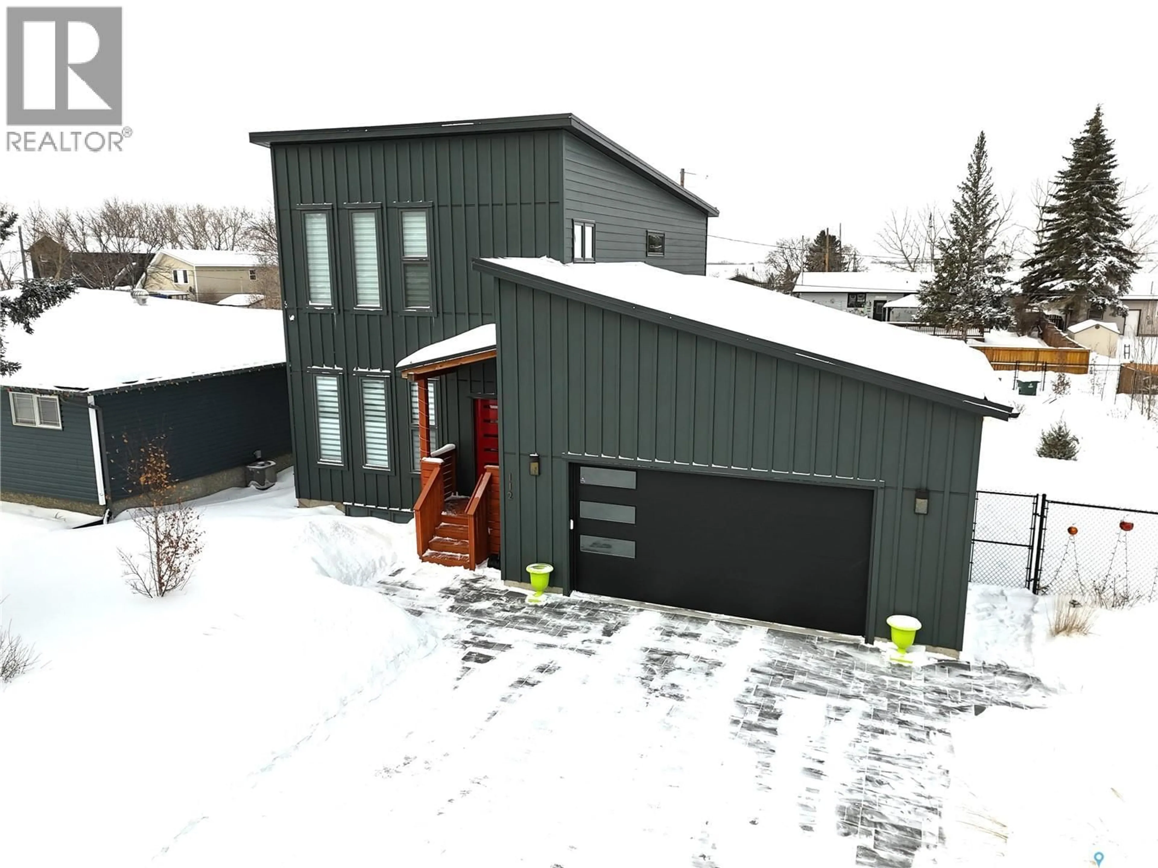 A pic from outside/outdoor area/front of a property/back of a property/a pic from drone, building for 112 NORMAN AVENUE, Aberdeen Saskatchewan S0K0A0