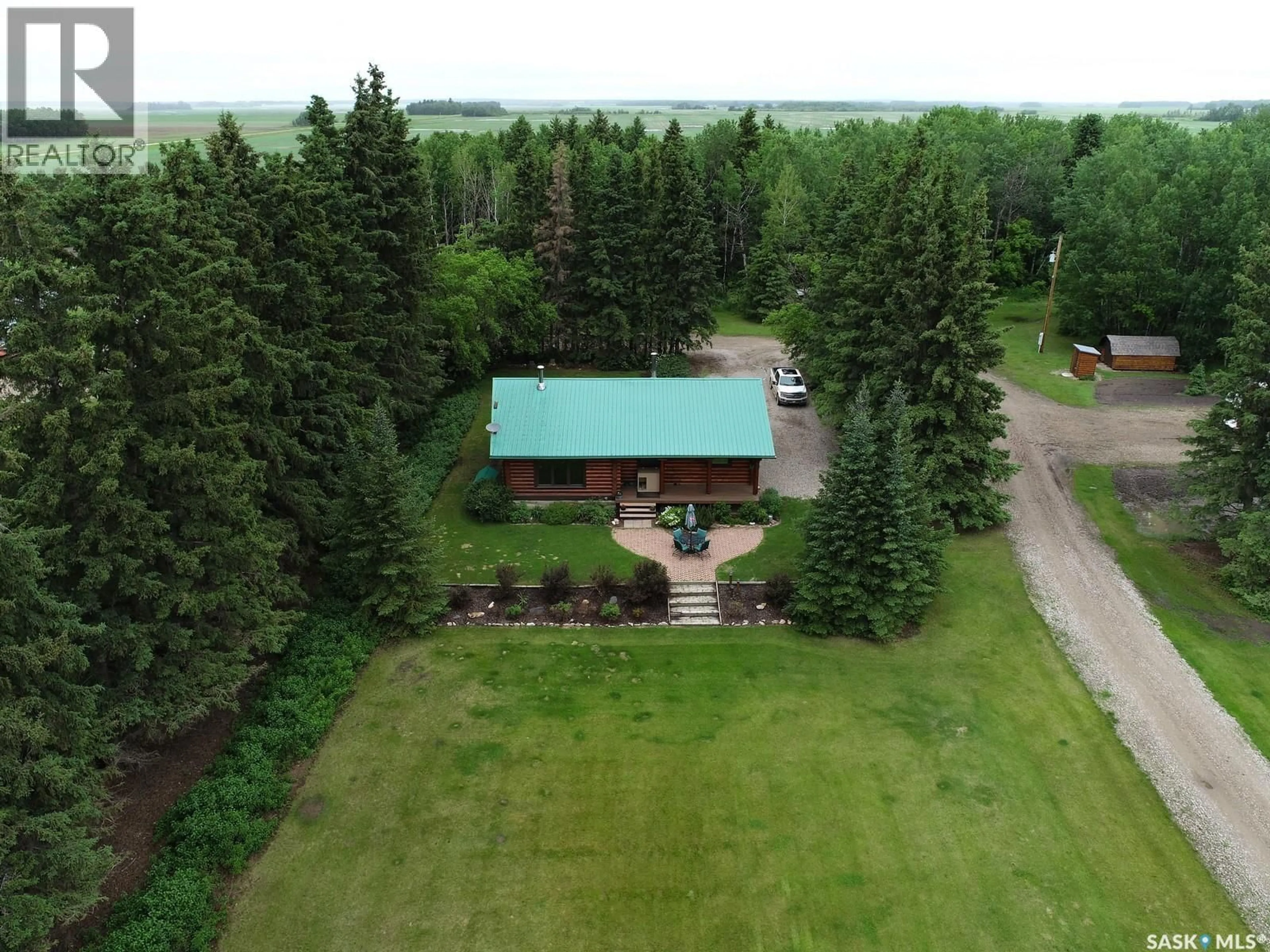 A pic from outside/outdoor area/front of a property/back of a property/a pic from drone, unknown for LOG ACREAGE, Torch River Rm No. 488 Saskatchewan S0J0M0