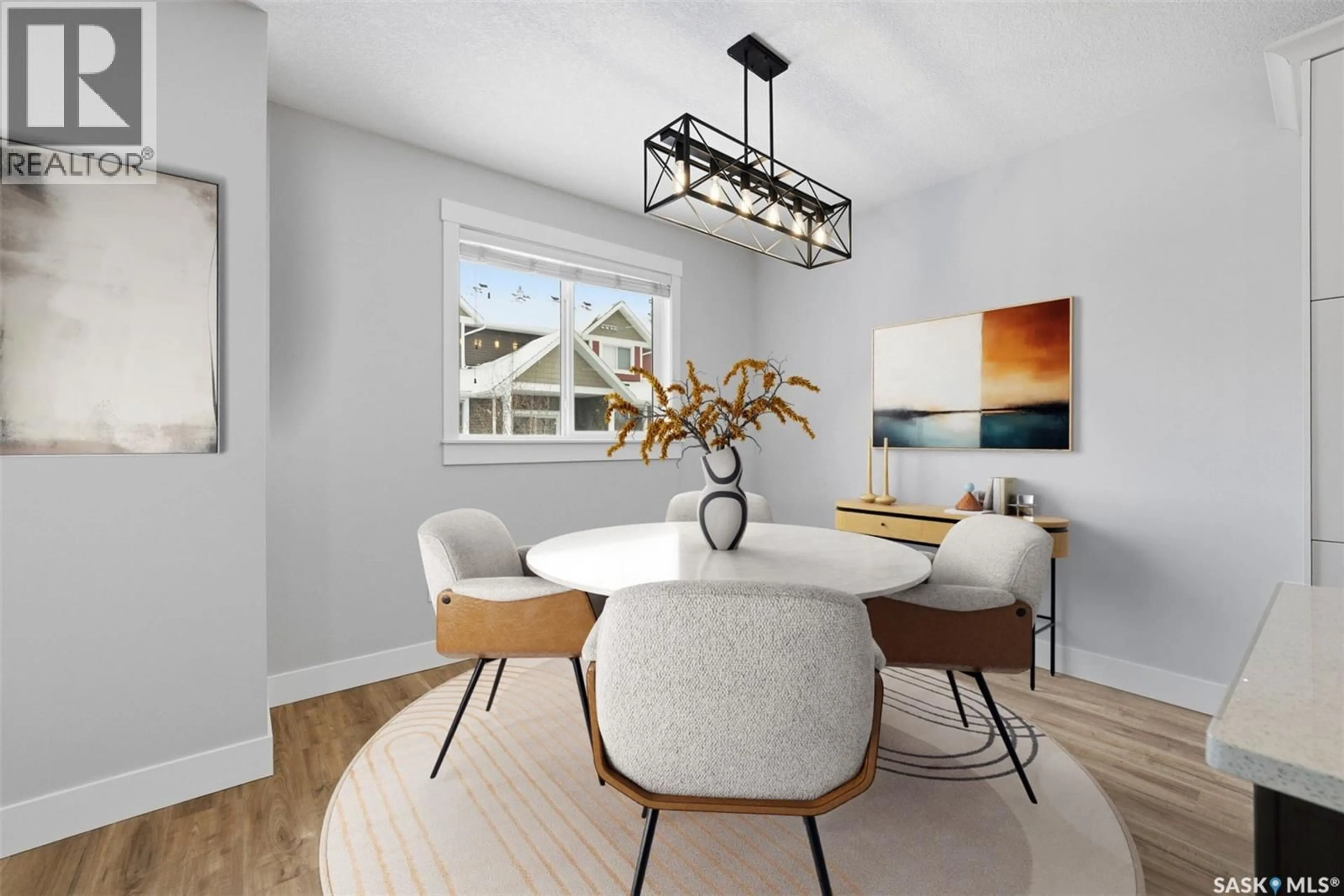 Dining room, wood/laminate floor for 209 - 3220 11TH STREET, Saskatoon Saskatchewan S7M5M4