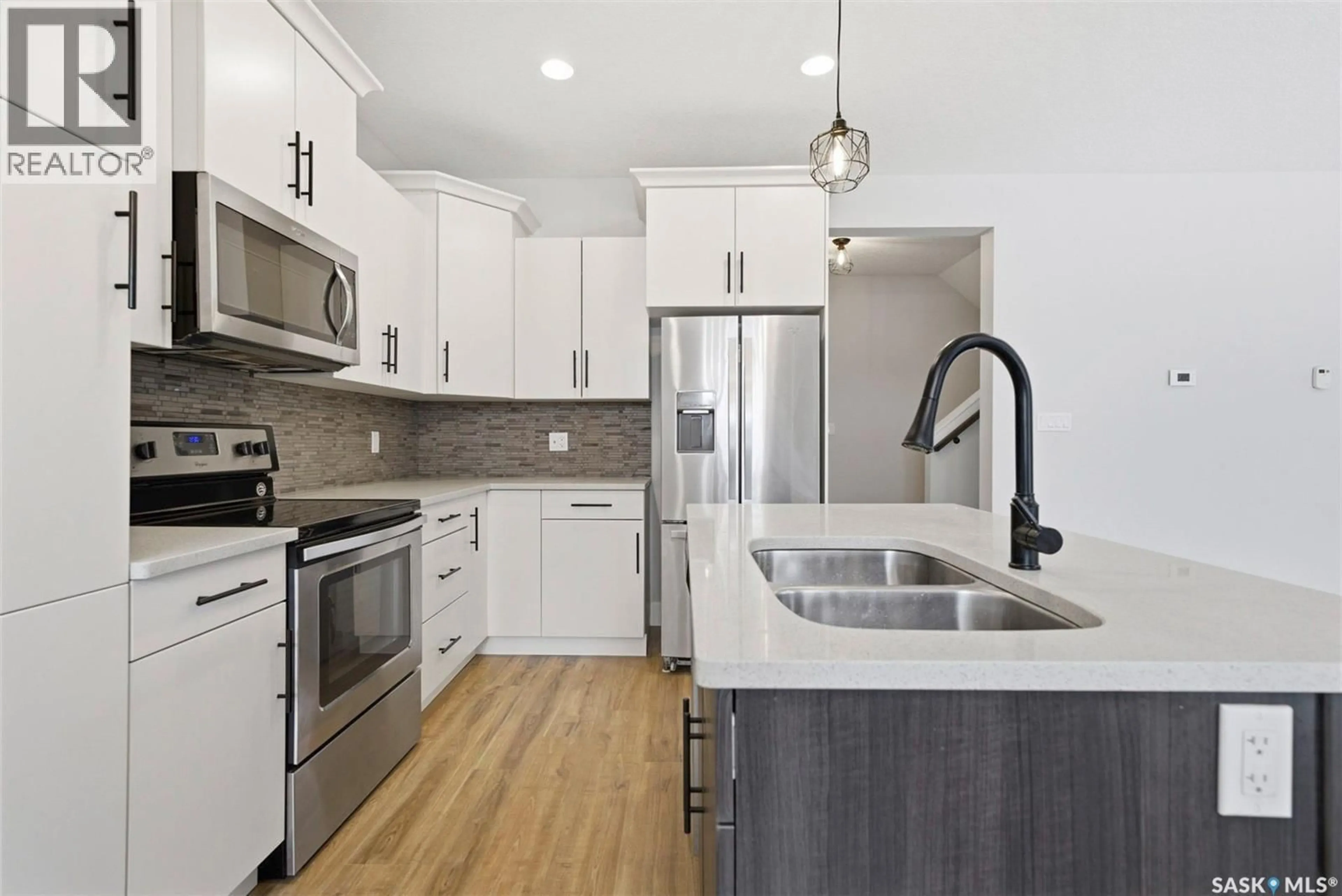 Open concept kitchen, unknown for 209 - 3220 11TH STREET, Saskatoon Saskatchewan S7M5M4