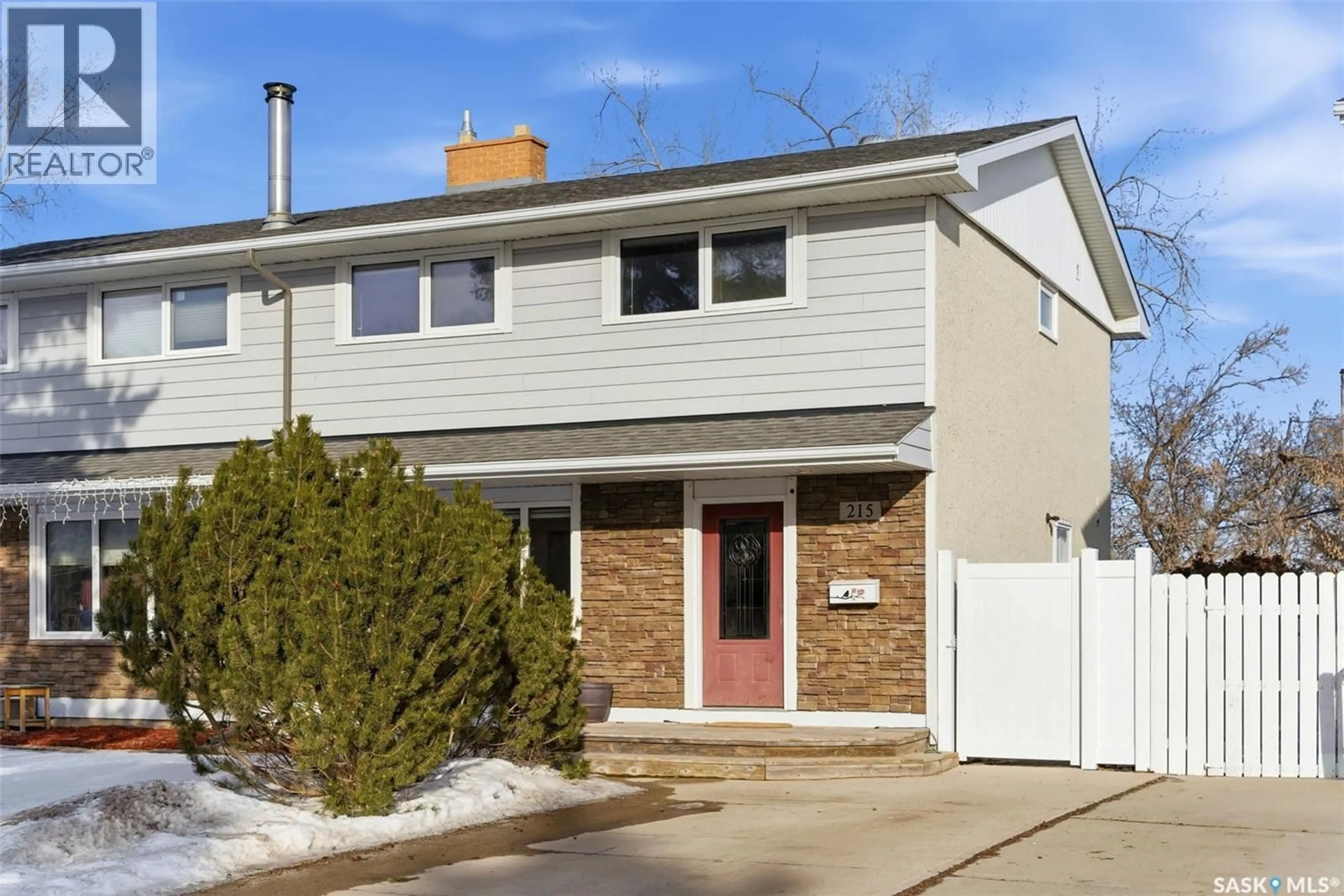 Home with vinyl exterior material, street for 215 DOROTHY STREET, Regina Saskatchewan S4T5V7