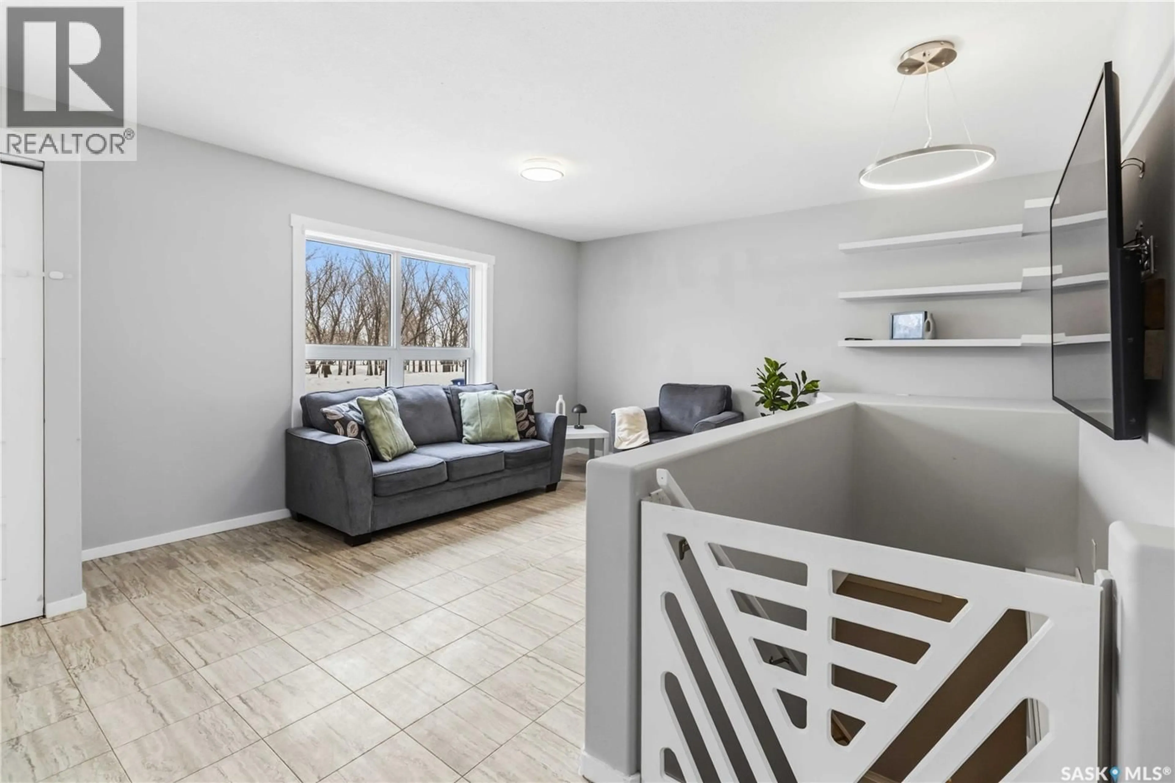 Living room with furniture, unknown for 115 9TH AVENUE, Warman Saskatchewan S0K4S1