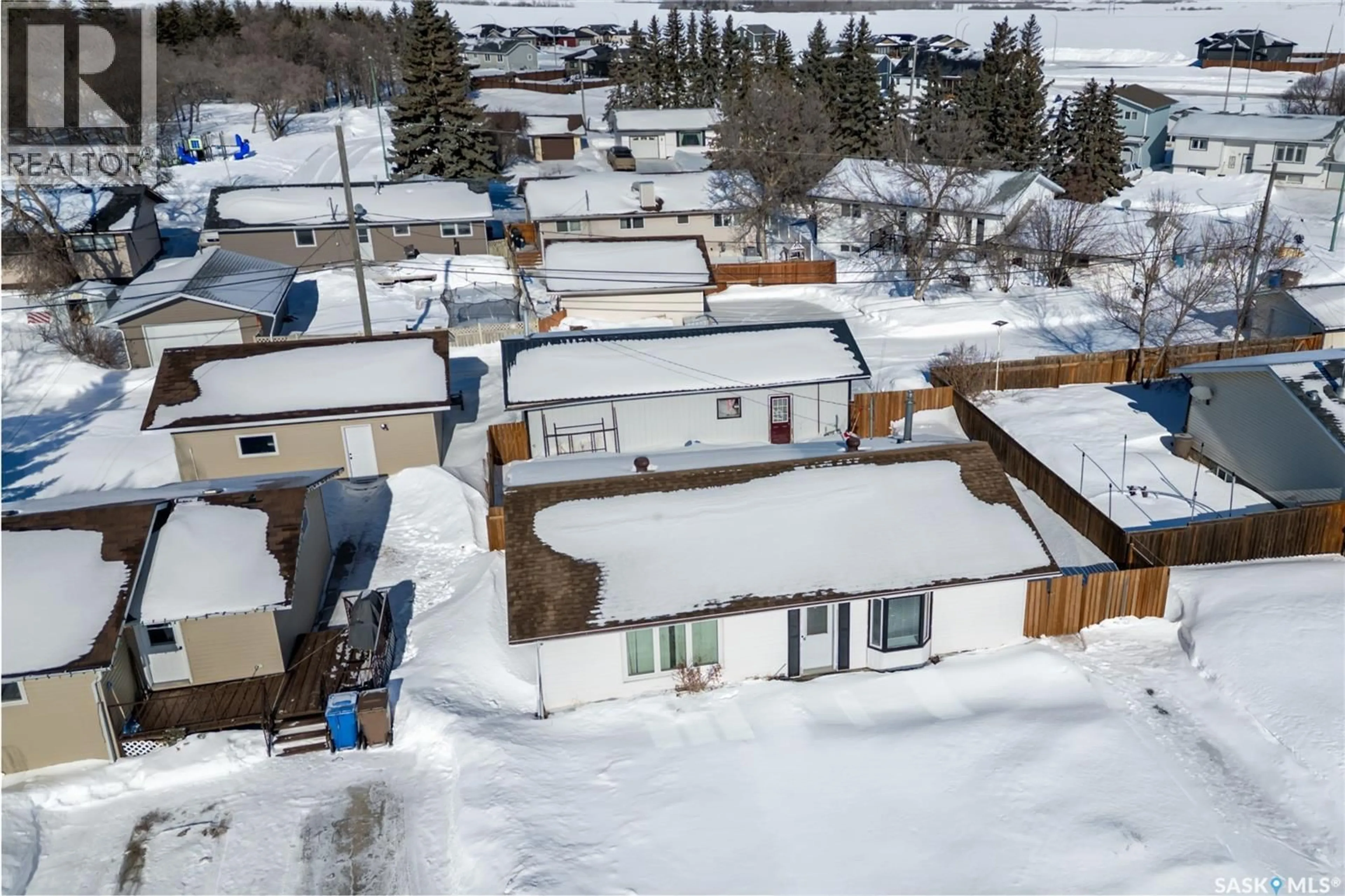 A pic from outside/outdoor area/front of a property/back of a property/a pic from drone, street for 114 SASKATCHEWAN CRESCENT, Kinistino Saskatchewan S0J0A6