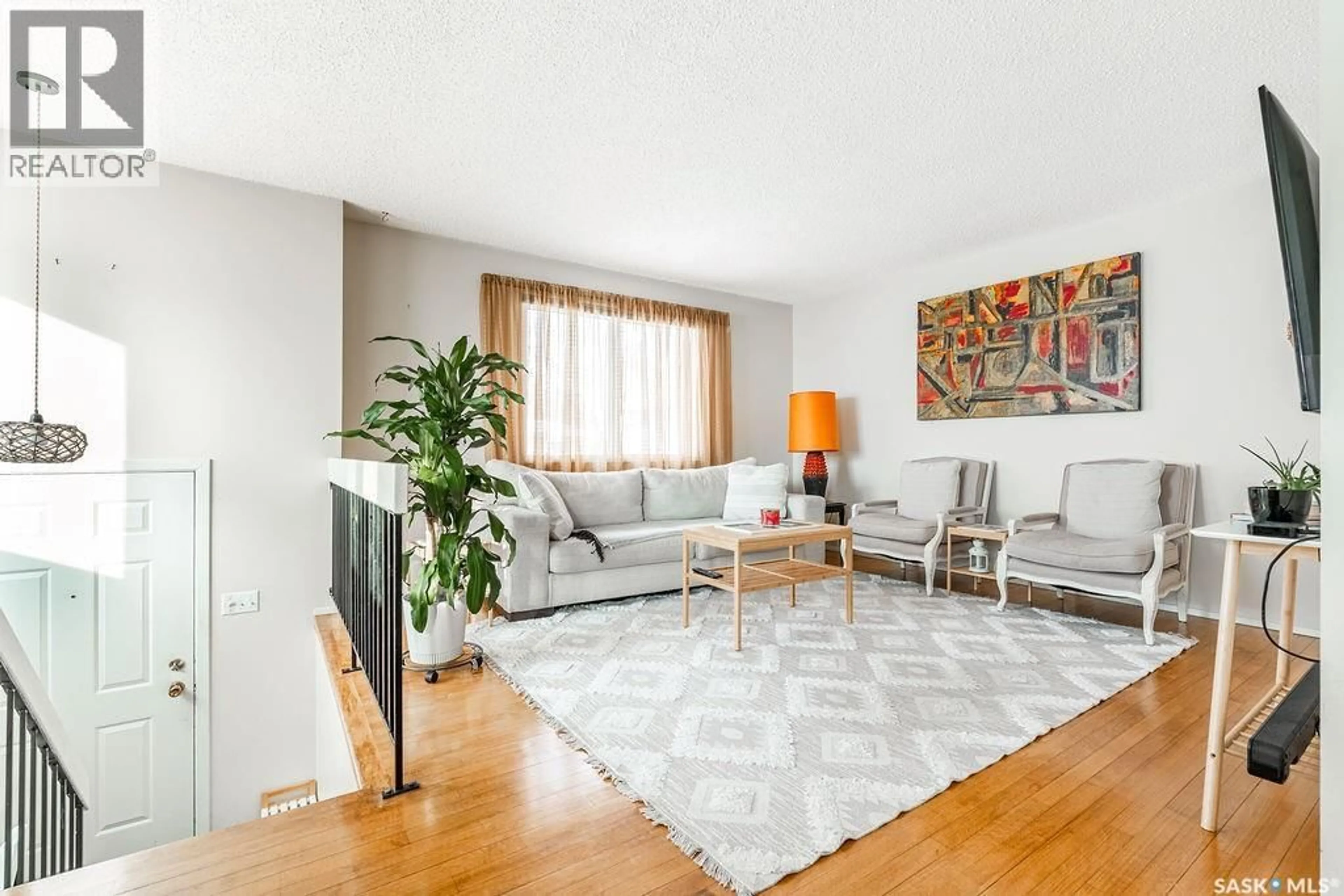 Living room with furniture, unknown for 724 M AVENUE, Saskatoon Saskatchewan S7M2L4