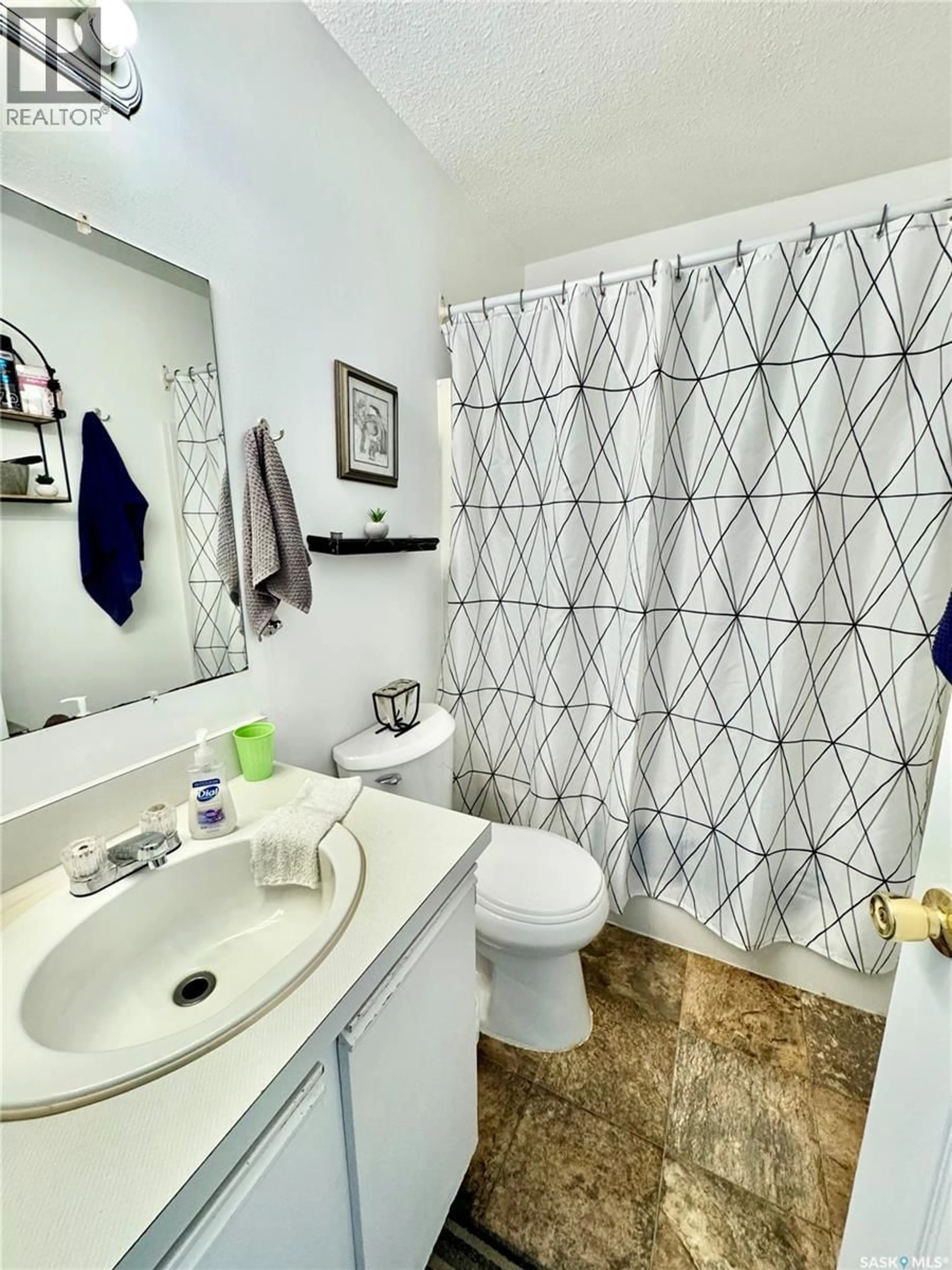 Standard bathroom, ceramic/tile floor for 1001 12TH STREET, Prince Albert Saskatchewan S6V3C9