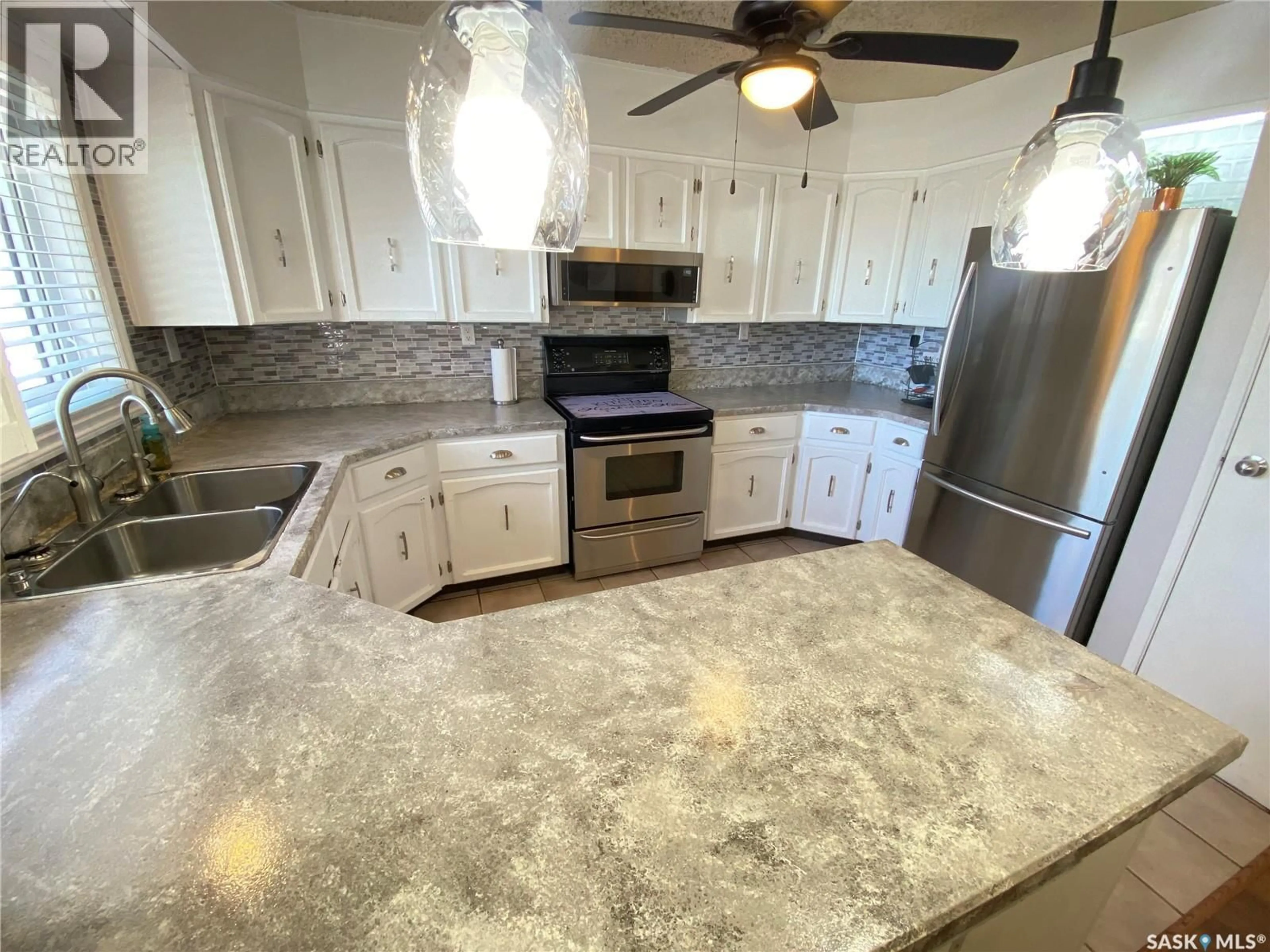 Open concept kitchen, ceramic/tile floor for 70 MATHESON CRESCENT, Yorkton Saskatchewan S3N3M3