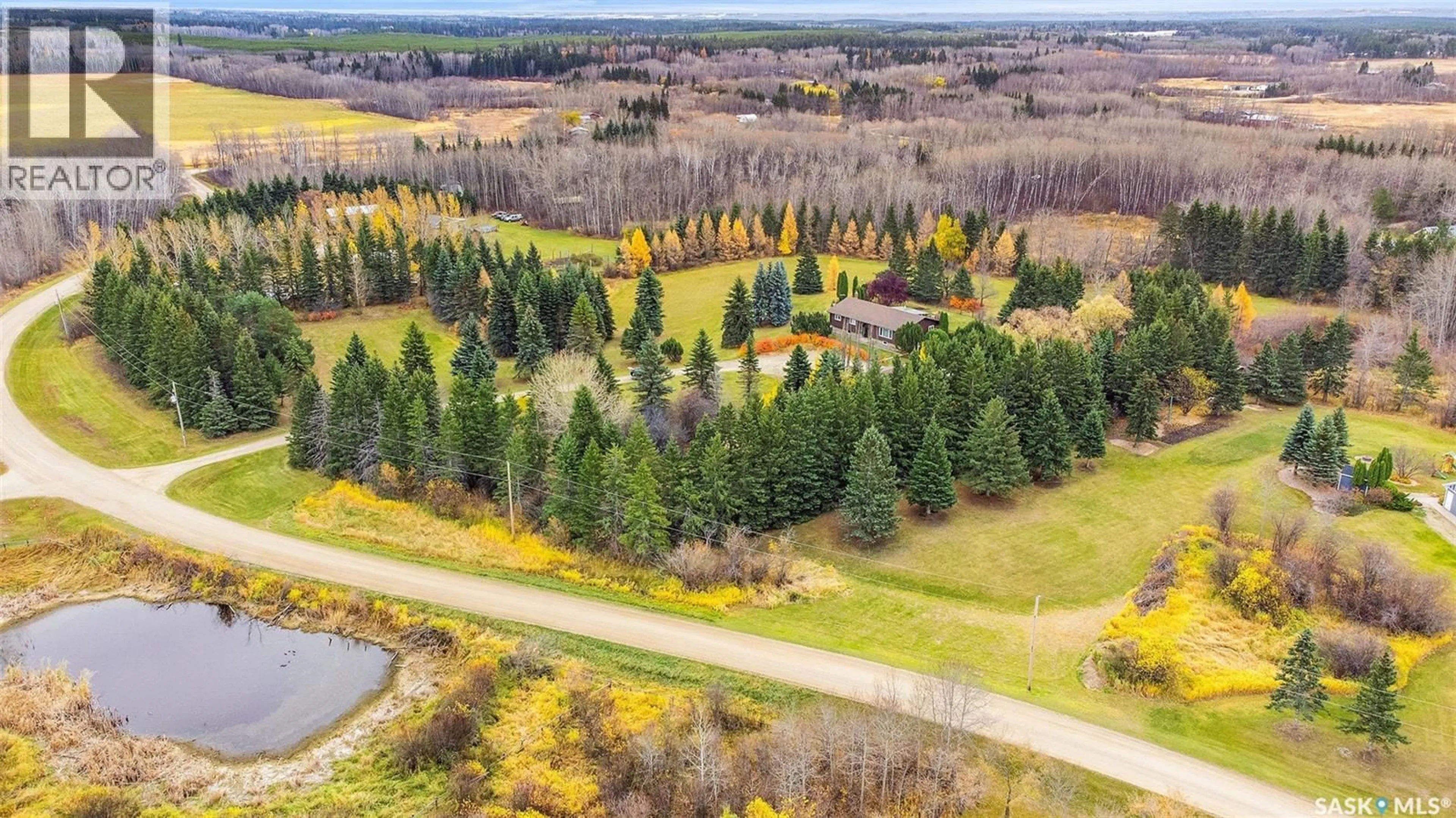 A pic from outside/outdoor area/front of a property/back of a property/a pic from drone, forest/trees view for 730 REID STREET, Buckland Rm No. 491 Saskatchewan S6V5R3